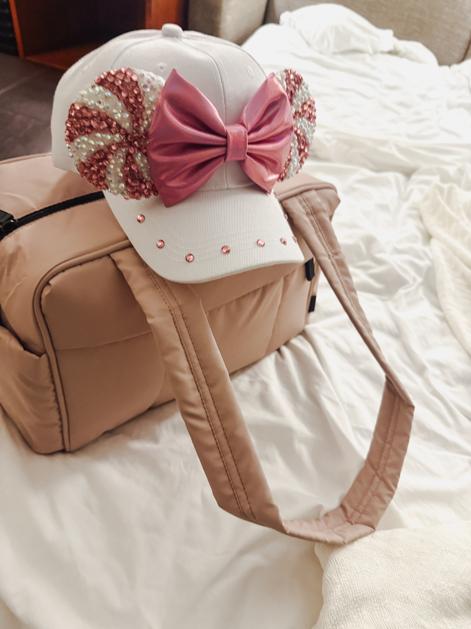 hat is from little ears boutique 
Love this travel bag - see more of my Disney outfits in my Disney collection 

Disney outfits, Disney holiday outfits, Disney style, Disney Christmas 

#LTKGiftGuide #LTKHoliday #LTKCyberWeek