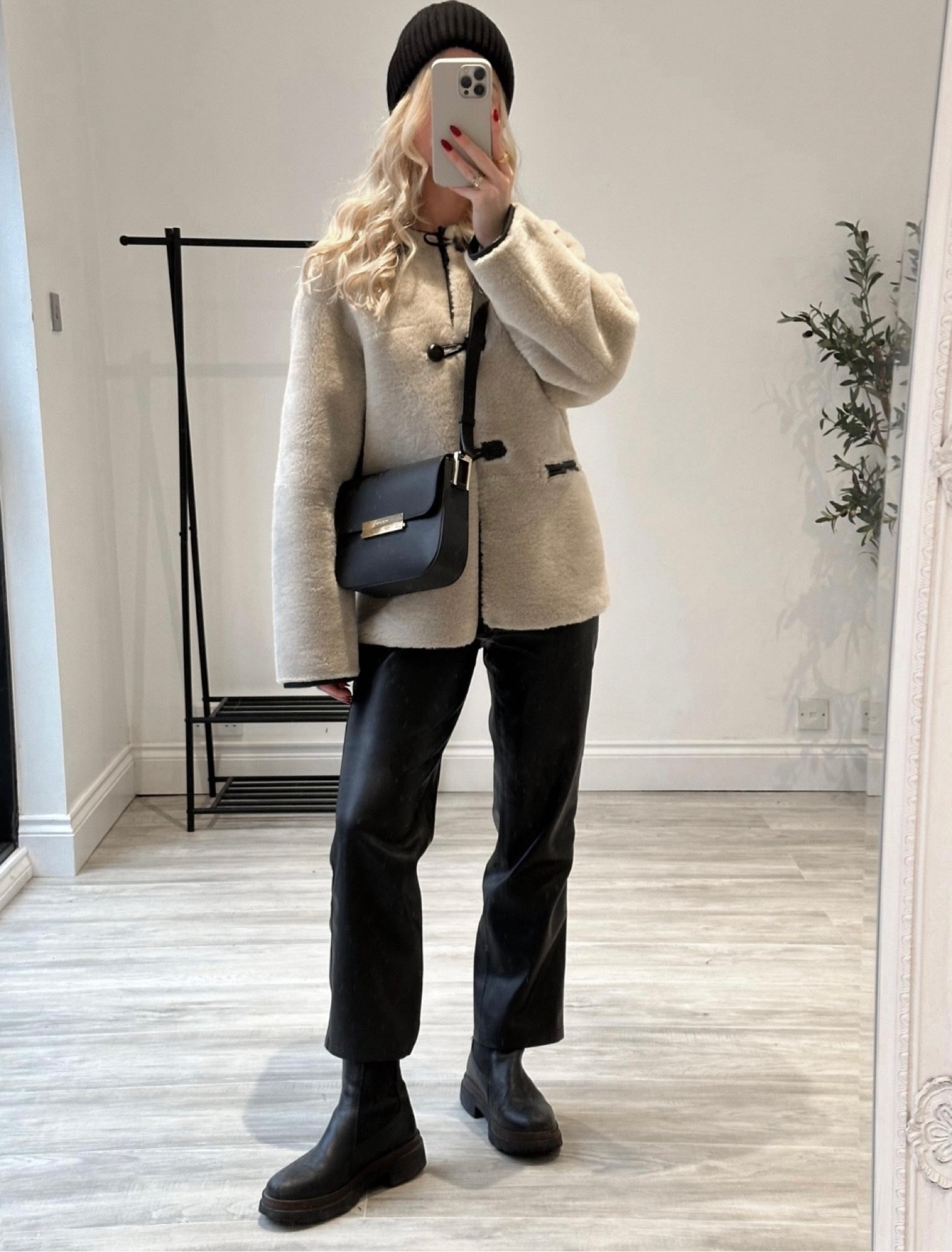 Faux fur jacket, mango, toteme dupe, leather trousers, mango, black boots, Ganni beanie, winter style

#LTKeurope #LTKSeasonal #LTKstyletip