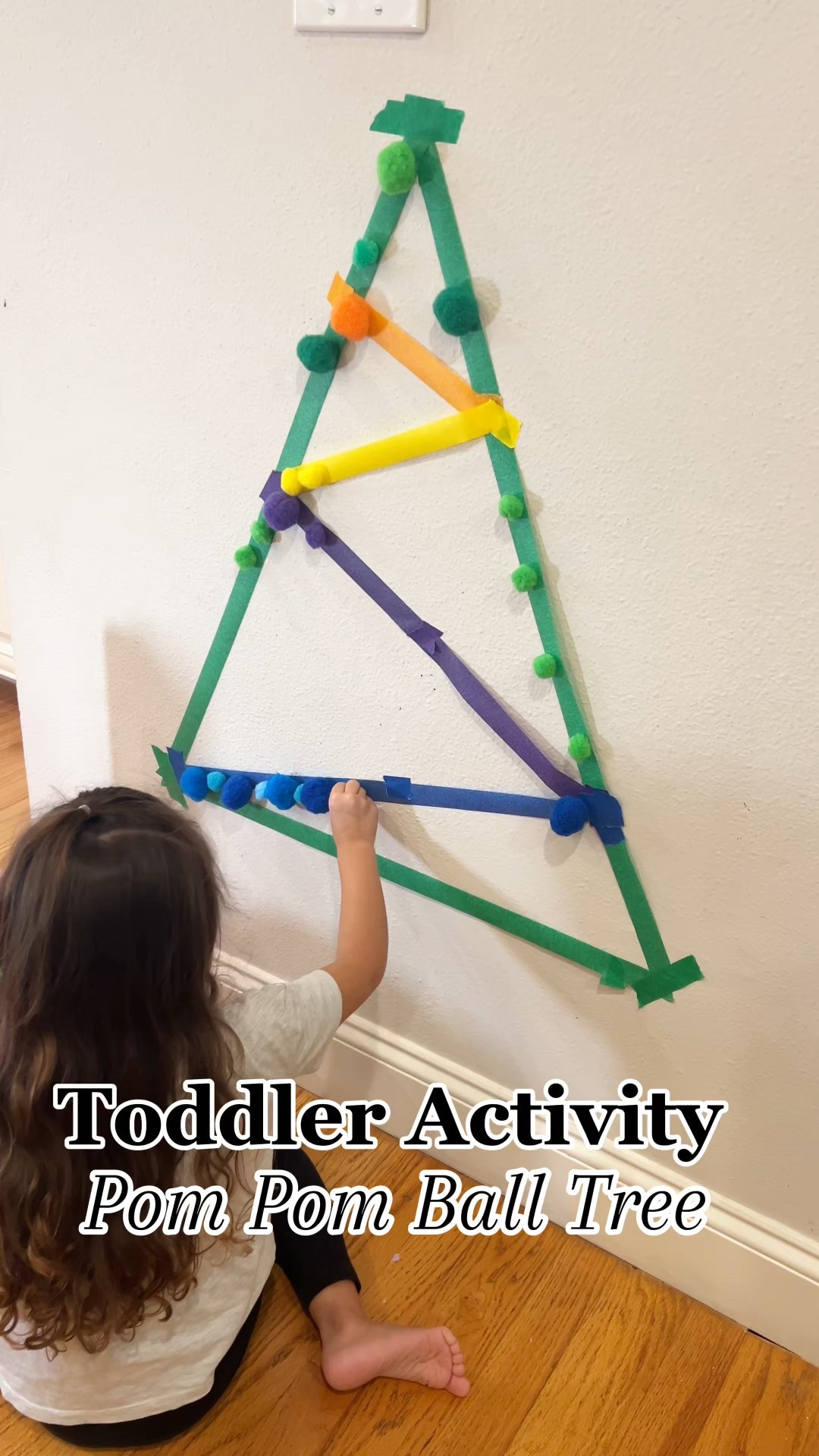 Sticky Pom Pom Tree
Comment TREE for a link to everything I used! 🌲✨

I made this Christmas tree by placing the painters tape with the sticky side facing OUT so the pom poms could easily stick—super simple and toddler-approved. 🎄💚

✨ Why we loved this:
• Great for fine motor skills
• Fun size + color exploration
• Quick setup with minimal supplies
• Perfect festive toddler activity

Save this for your next Christmas play moment! 🎅🏽

#LTKKids #LTKmomlife #LTKHoliday