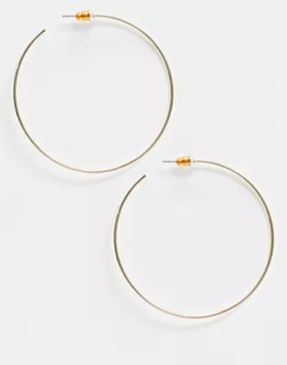 ASOS DESIGN fine wire 50mm hoop earrings in gold tone | ASOS (Global)