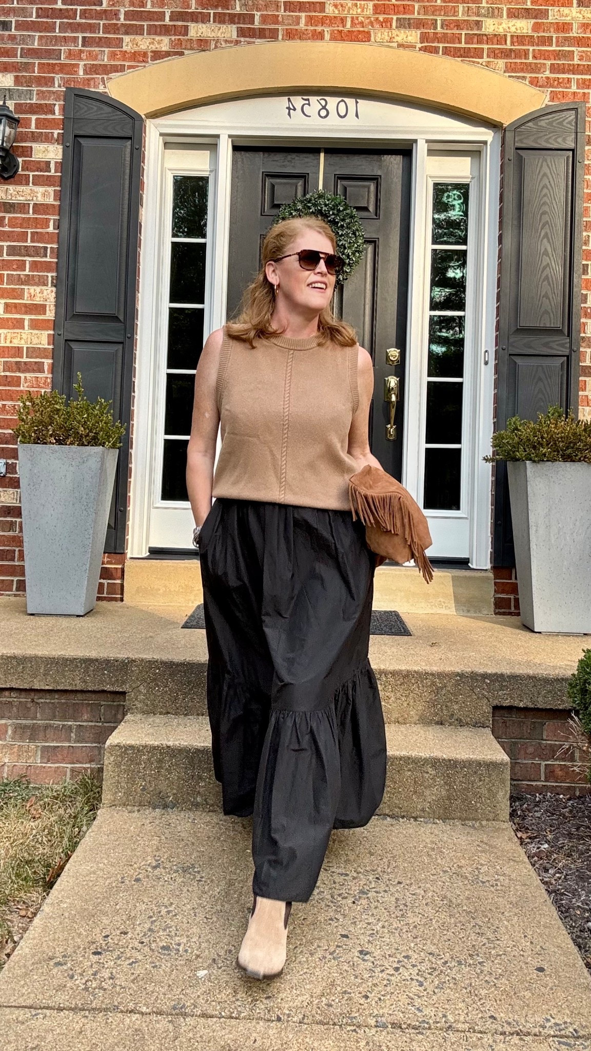 🍁 Prefall layers 🍁 Transitioning my maxi black  dress with a camel vest, suede boots and slouchy brown bag. 

#LTKStyleTip #LTKMidsize #LTKOver40