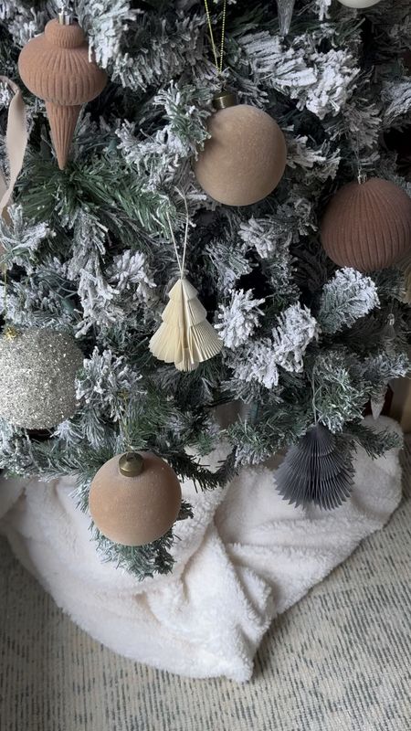 Our flocked tree is filled with different textural ornaments with a neutral chiffon ribbon to bring it all together. 

Christmas tree, Christmas decorating, holiday decor

#LTKSeasonal #LTKHoliday #LTKhome