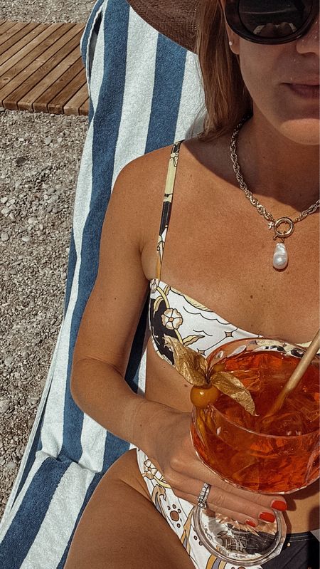 Amalfi Coast 🍹 Tory Burch swimwear, coastal caviar necklace, Celine oval glasses, Janessa Leone packable hat Valentine 

#LTKSeasonal #LTKSwim #LTKTravel