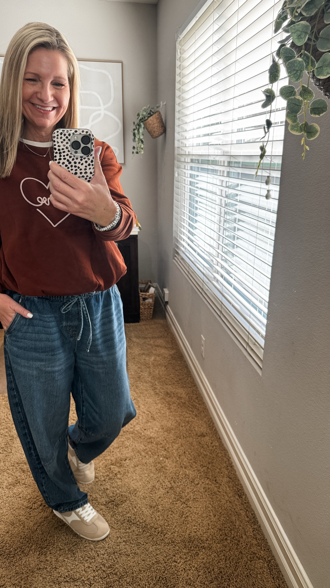 Friday Finds! I have to give credit to my husband who ordered clothes for me for Christmas for the first time in years, all from Loft. While I had to adjust sizing, I think he’s learned a thing or two from following my page. 

These drawstring barrel jeans are so soft and comfy and can easily be dressed up too. I would size down at least one size. 

My sweatshirt is a great option if you have a hard time pulling off red like I do. I love the brown color of this one. I sized up to a medium. 

And my neutral sneakers were my own find from Target. I have these in the chocolate brown too and love them. These will be perfect for Spring. 

#LTKFindsUnder50 #LTKootd #LTKOver40