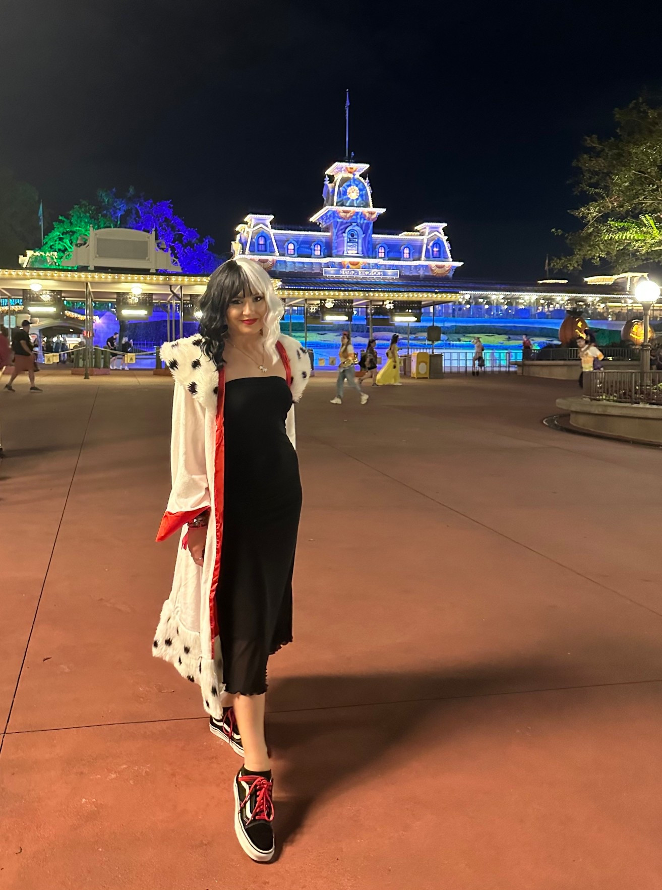 Mickeys Not So Scary Halloween Party Inspo! Cruella! 

Wig: Shein 
Dress: Shein
Coat: Disney, bought on Halloween Costumes website 
Shoes: Vans with added red laces from Amazon
Necklace: Amazon