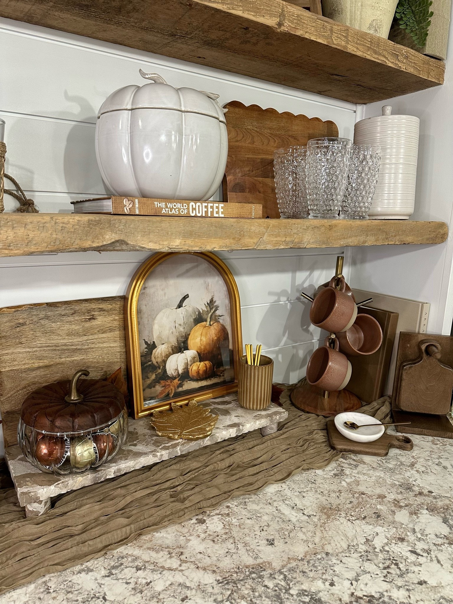 Cozy Fall Coffee Bar Finds 🍂☕️

A few warm fall touches completely transformed this little coffee bar! I love the mix of rich wood tones, pumpkin accents, textured glassware, and that pretty fall artwork. Everything feels cozy and collected without going overboard for the season.

#FallCoffeeBar #CoffeeBarDecor #FallKitchenDecor #PumpkinDecor #FallHomeDecor #marbleriser

#LTKSeasonal #LTKSaleAlert #LTKHome