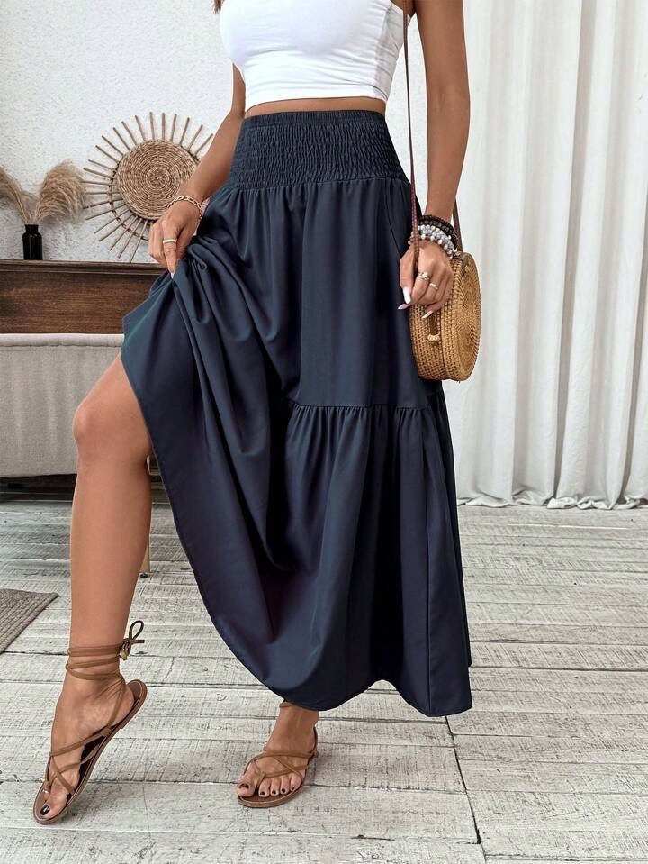 This tiered navy maxi skirt is a versatile summer staple. Lightweight with a stretchy waistband and flowy silhouette — easy to dress up or down with tanks, crop tops, or lightweight knits.

#LTKSeasonal #LTKU #LTKSummerEdit