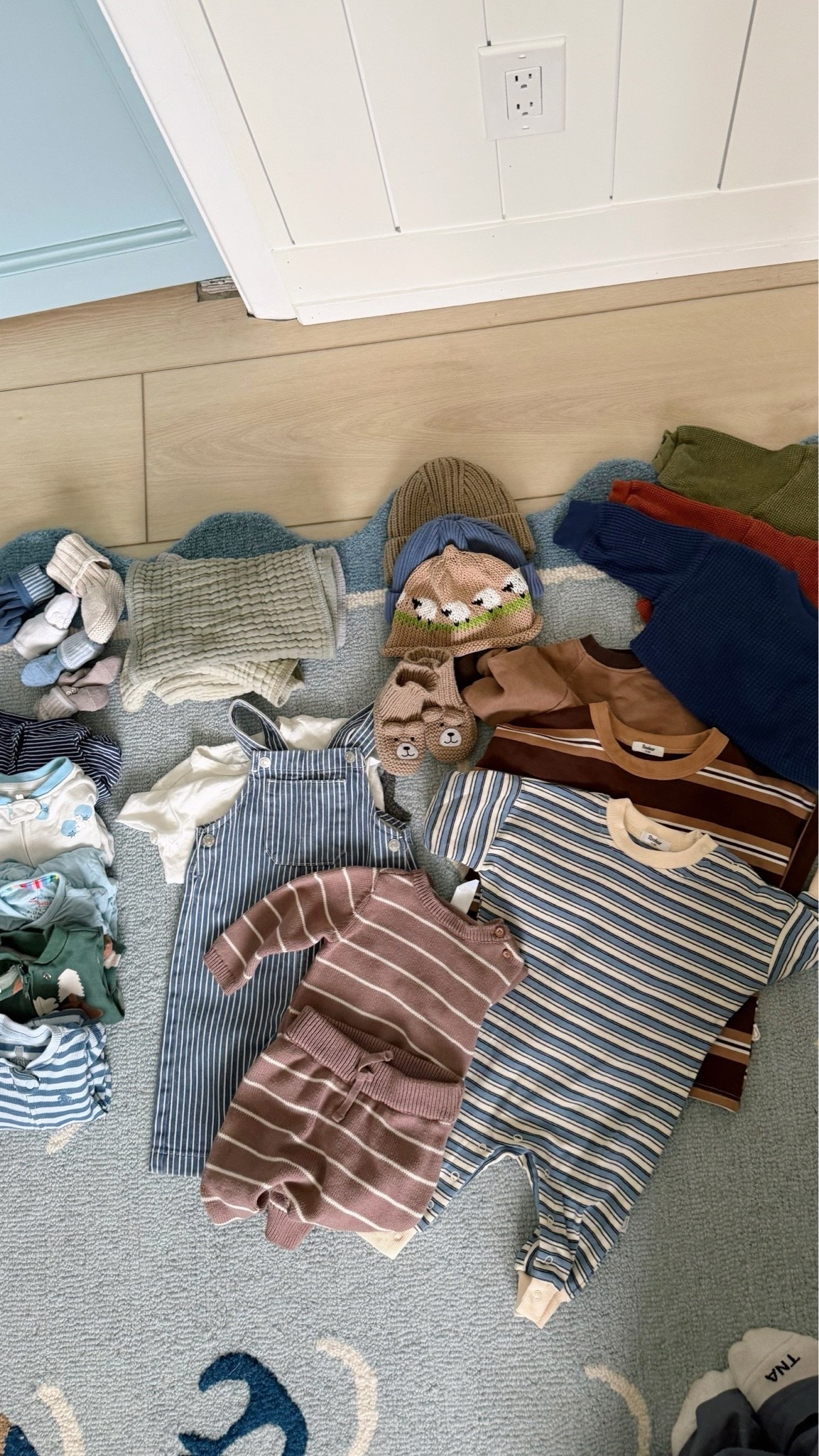 What we packed for August for the mountains!! Stripe jumper is from the brand Roobear