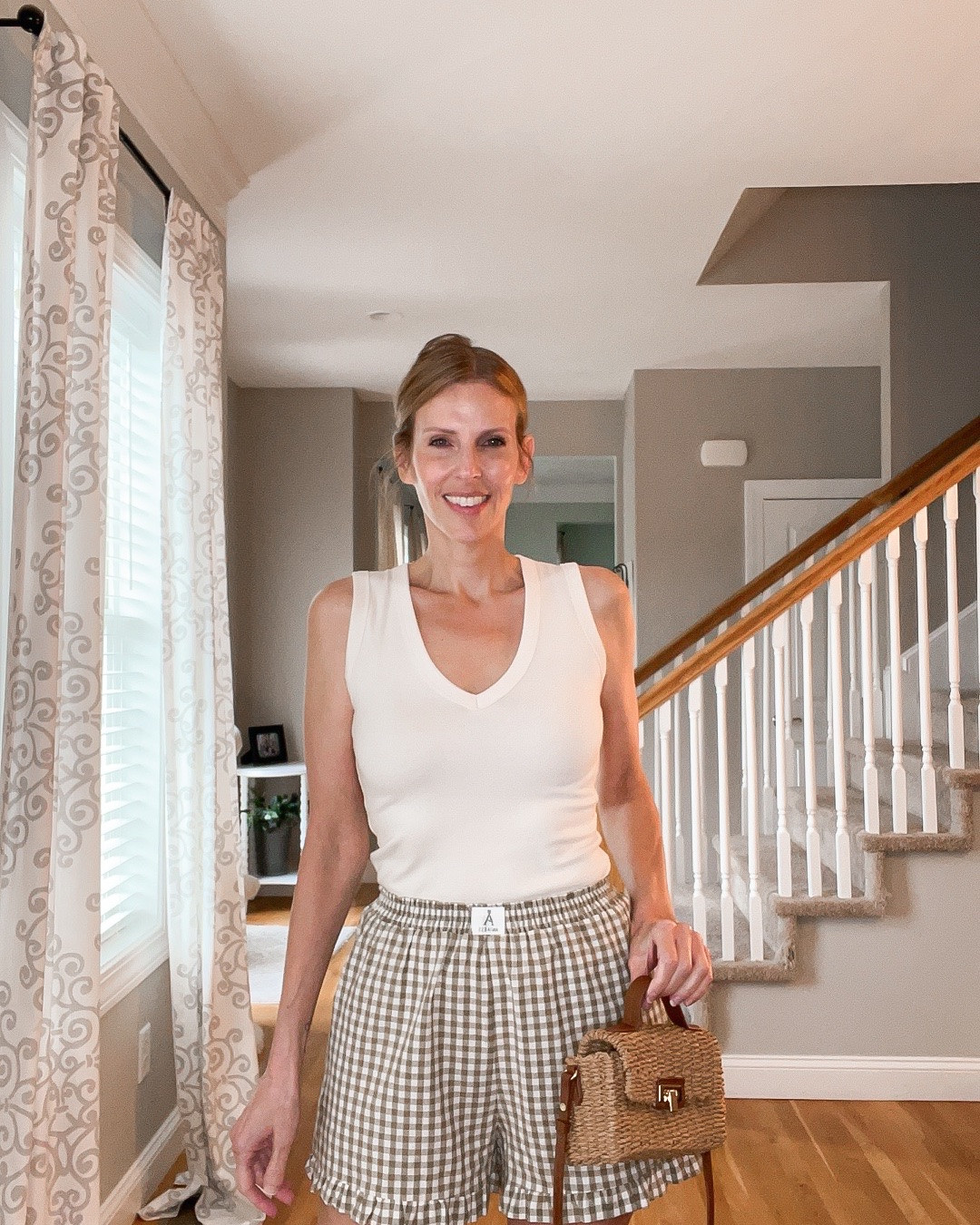 🤍☀️ Summer outfit of the day ✨

A classic white tank, gingham shorts, and a woven bag—easy, comfortable, and perfect for warm-weather days. 👜🌿

#LTKSeasonal #LTKOver40