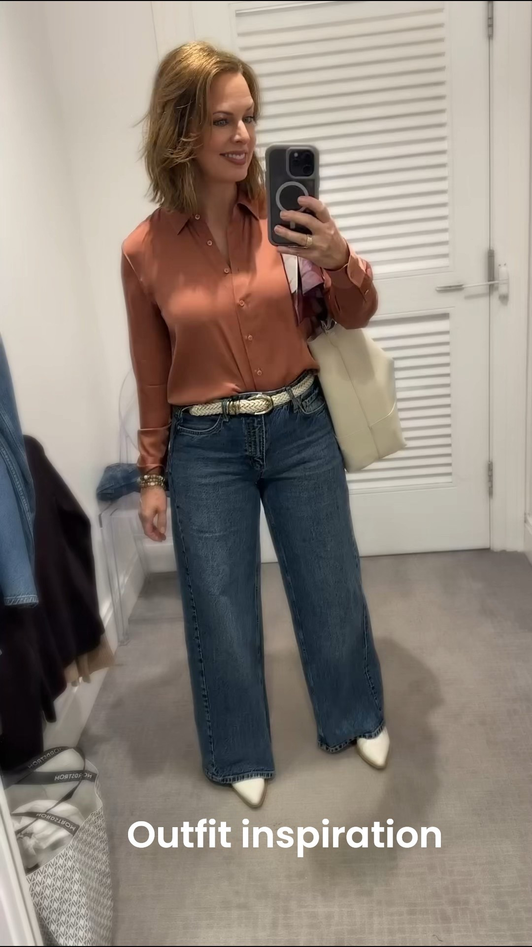 Choose IVORY over black and you’ll look extra fashionable, the unexpected and confident choice! I wanted to be comfortable while shopping (lots of walking) but also wanted to look great, of course! A silk blouse dressed up my jeans, a pointed toe low-heel bootie is more elevated than a sneaker. These wide leg jeans are trendy and very comfortable. 

#LTKOver40