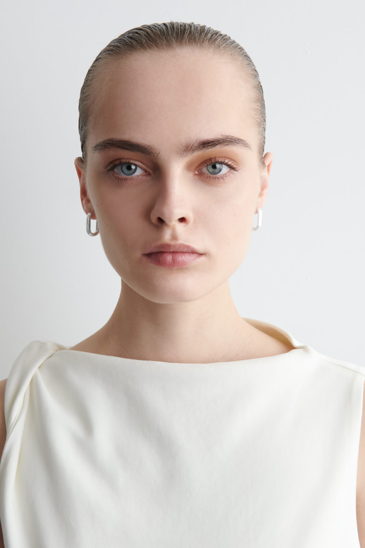 OVAL HOOP EARRINGS - SILVER | COS | COS UK