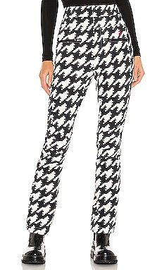 Perfect Moment Aurora High Waist Flare Pant in Black & Snow White Houndstooth from Revolve.com | Revolve Clothing (Global)