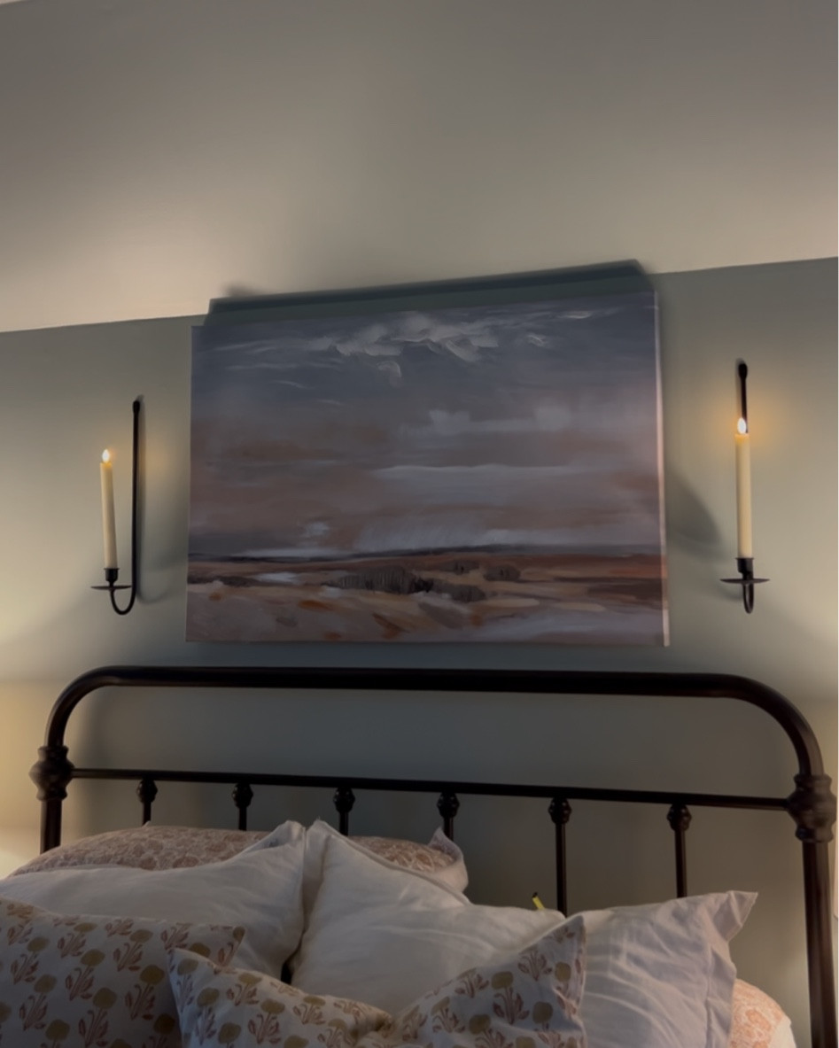 Love how these battery operated taper candle holders turned out above my bed!

#LTKHome