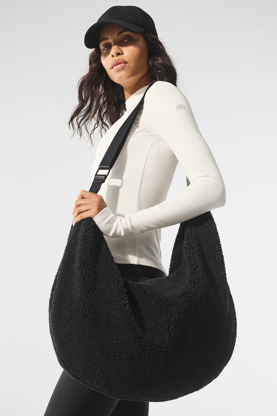 Alo YogaÂ® | Sherpa Om The Go Sling Bag Jacket in Black | Alo Yoga (US)