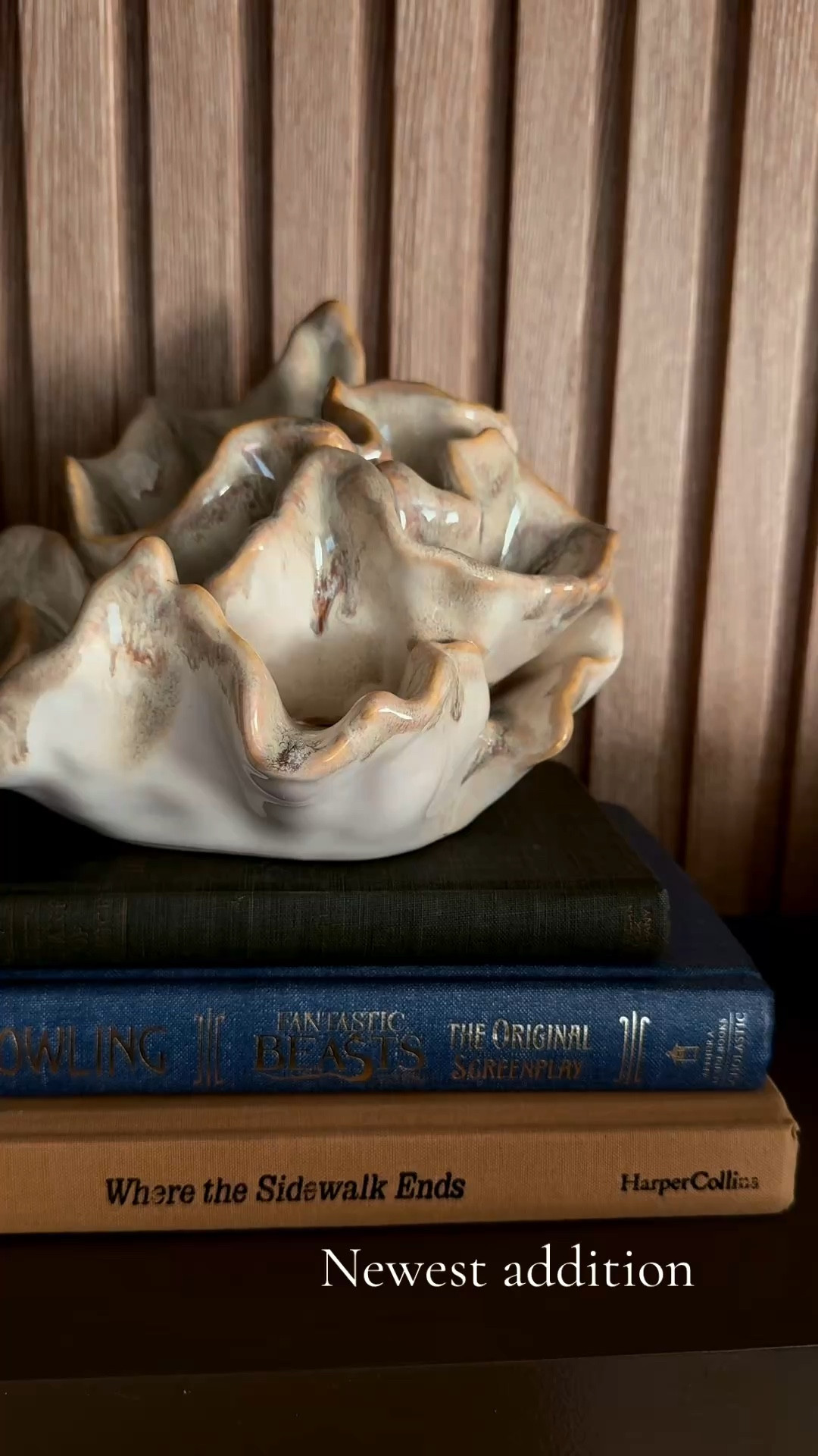 Shelf styling that actually means something. This little corner has a ceramic sculptural bowl, a green aventurine tower point, and two of my favorite books stacked underneath. Fantastic Beasts and Where the Sidewalk Ends have been on my shelf since forever and they work so well as a riser for decorative objects. The wood slat wall behind it ties everything together with that warm, organic feel.
Green aventurine is the stone of opportunity and heart chakra healing. Having it on your shelf is not just decor, it is intention. Linked everything I could find on LTK including similar ceramic bowl finds, crystal tower points, and bookshelf styling picks from Target and Amazon.

green aventurine crystal tower, shelf styling ideas, bookshelf decor, crystal home decor, ceramic bowl decor, Target home finds, Amazon home decor, wood slat wall decor, neutral home aesthetic, crystal healing decor, intentional home styling, cozy shelf vignette, stacked book decor, organic modern home, crystal point obelisk

#shelfstyling #crystaldecor #greenaventurine #homedecor #bookshelfdecor #targethome #amazonhome #organicmodern #crystalhealing #intentionalliving #neutralhome #shelfvignette #crystaltower #homeinspo #ltkhome #ltkfind #ltkunder50 #woodslatwall #cozyhome #heartchakra​​​​​​​​​​​​​​​​


#LTKHome