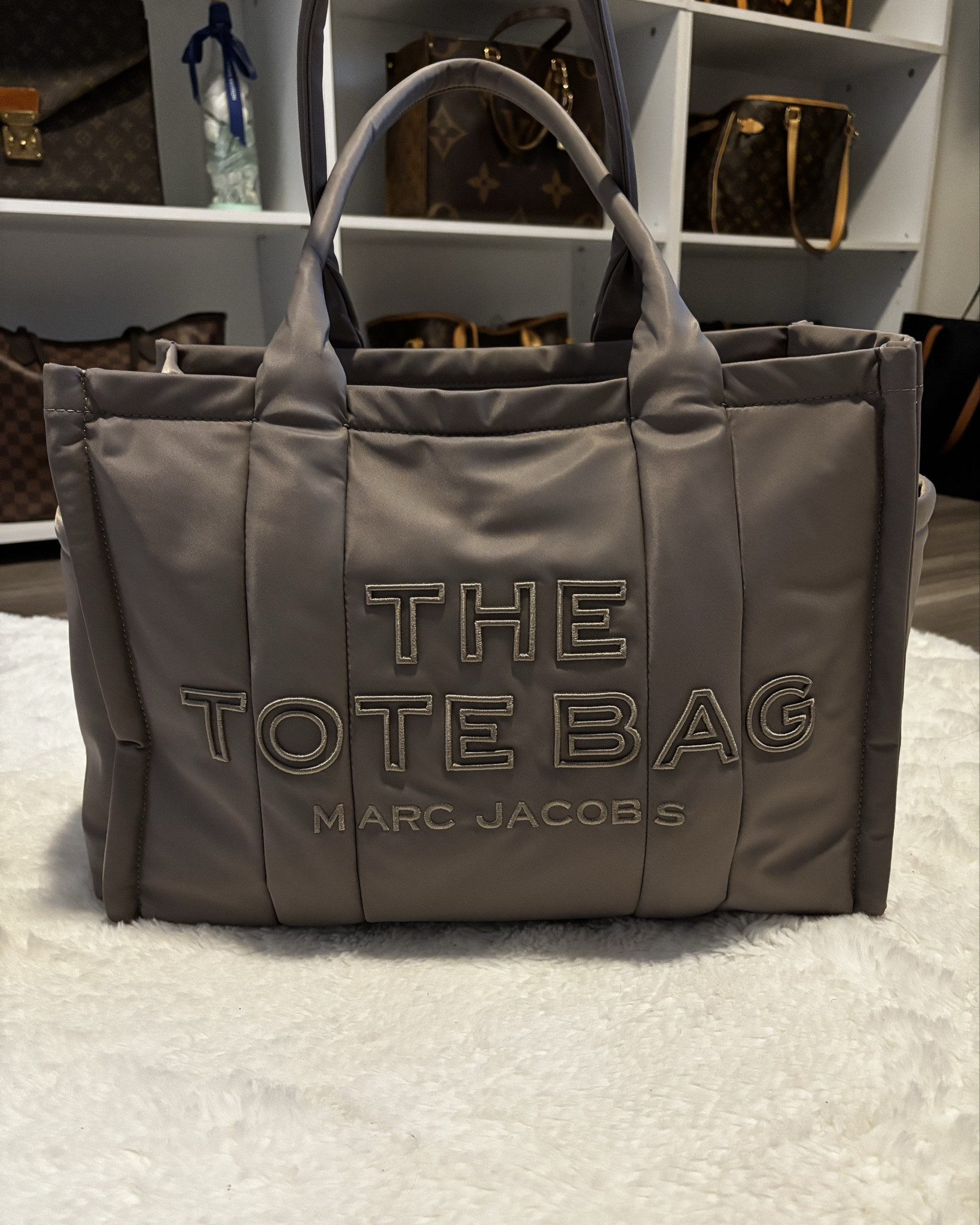 The Puffy Nylon Large Tote Bag. My absolute favorite work bag with side pockets. 



#LTKItBag #LTKStyleTip