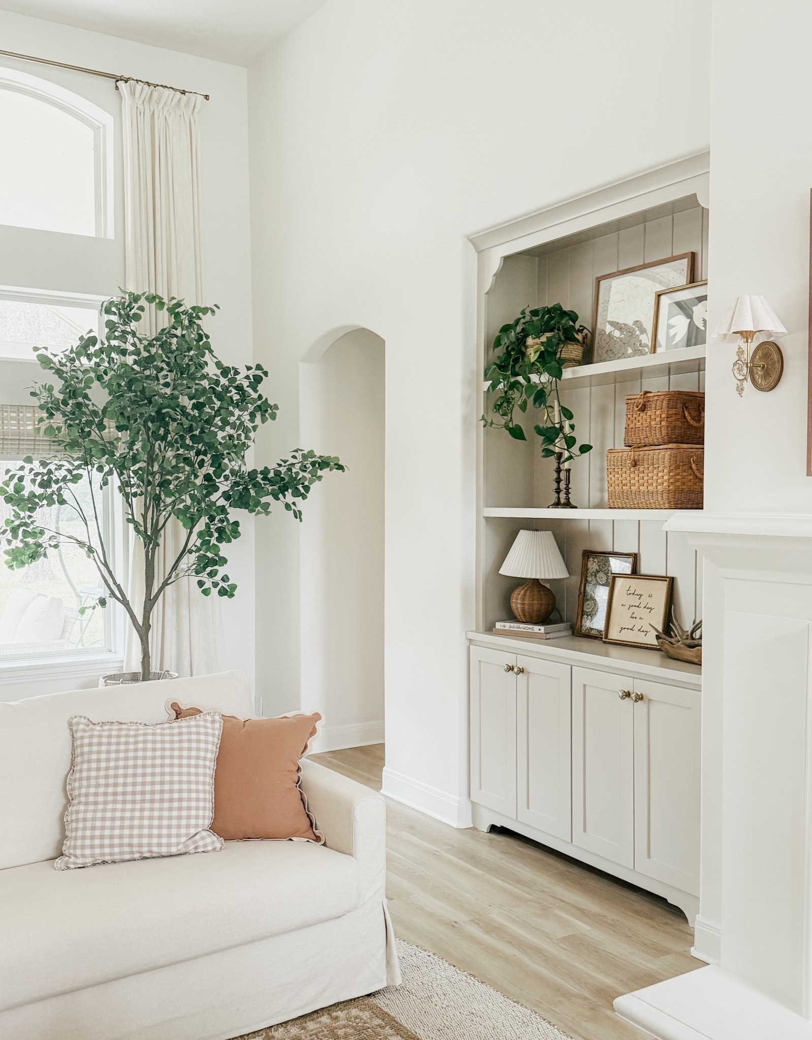 This faux tree is the best one on the market in my opinion! It’s SUPER tall and large!!! These curtains I ordered on Amazon to get my custom size and length! They are gorgeous! Got the color ivory white with the pinch pleat top! 

THEBLOOMINGNEST home decor living room rug coffee table sconce lamp target pottery barn 

#LTKSeasonal #LTKSpringSale #LTKHome