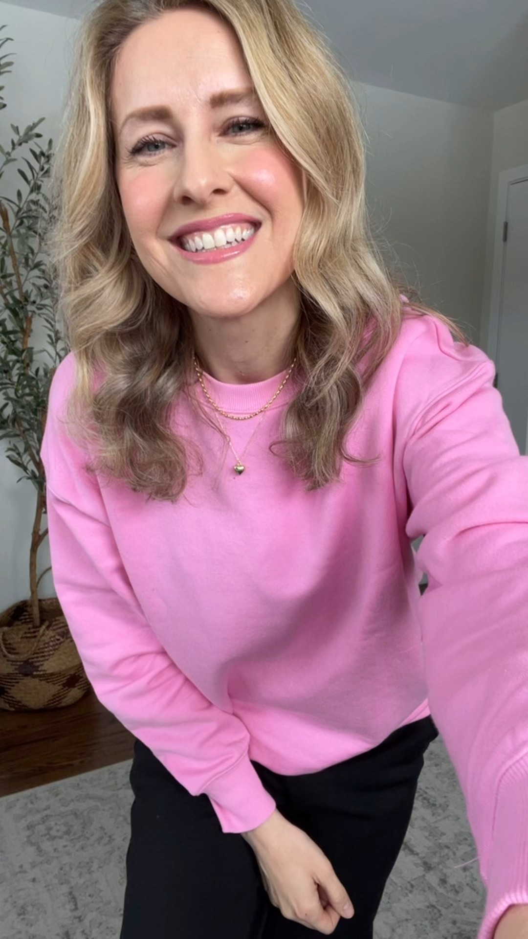 This pink is making me happy! $12.98 sweatshirt at Walmart, nice cotton fleece that washes well. I’m wearing a medium. Four colors. #walmartfashion #momstyle 