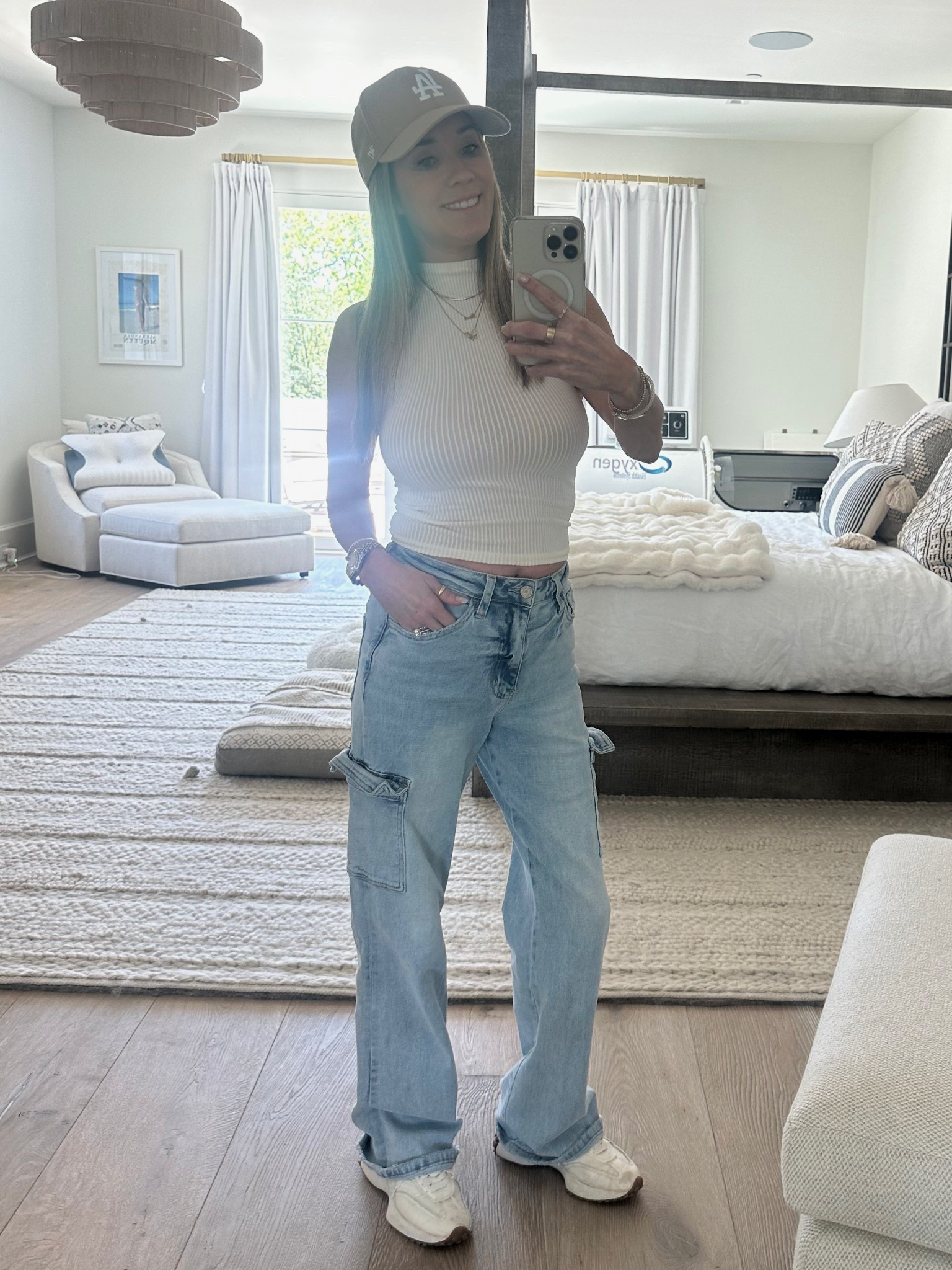 Sunday Vibes 🤍🦋🤍 Cargo Jeans, Mockneck Sleeveless Tank, White Sneakers, and my LA Dodgers Hat! Happy Sunday, friends! ✌️ 

#LTKStyleTip #LTKPetite #LTKFindsUnder50