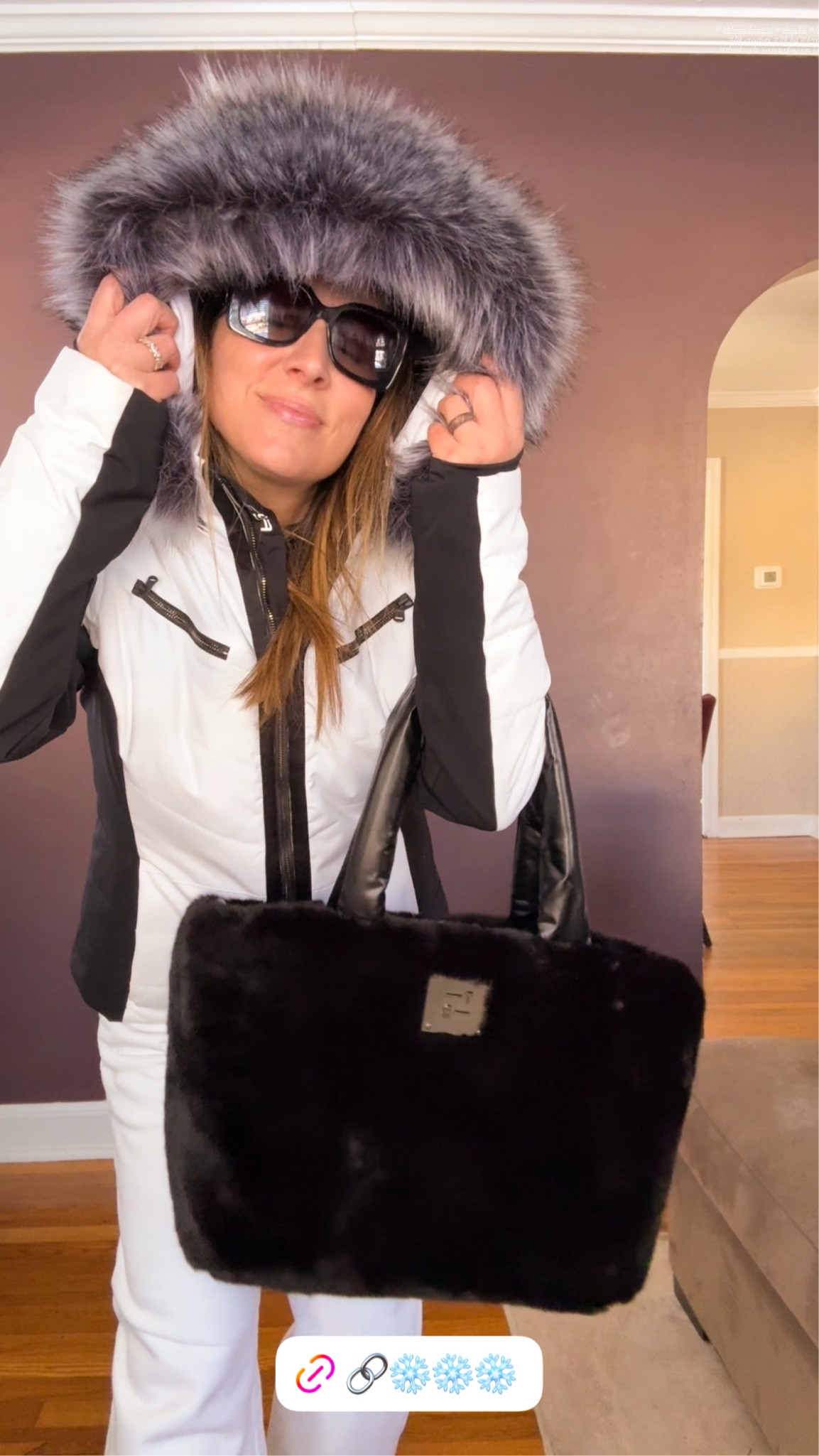 I love this new tote!  The fur is so soft and it is reversible. The inside is a beautiful shiny black.  Def can use it all year round!  My ski coat and white lounge pants to create a black and white winter look. //. Winter outfit. Ski outfit. Tote bag. Chanel sunglasses. Work outfit. Vacation outfit  

#LTKFindsUnder100 #LTKSeasonal #LTKItBag