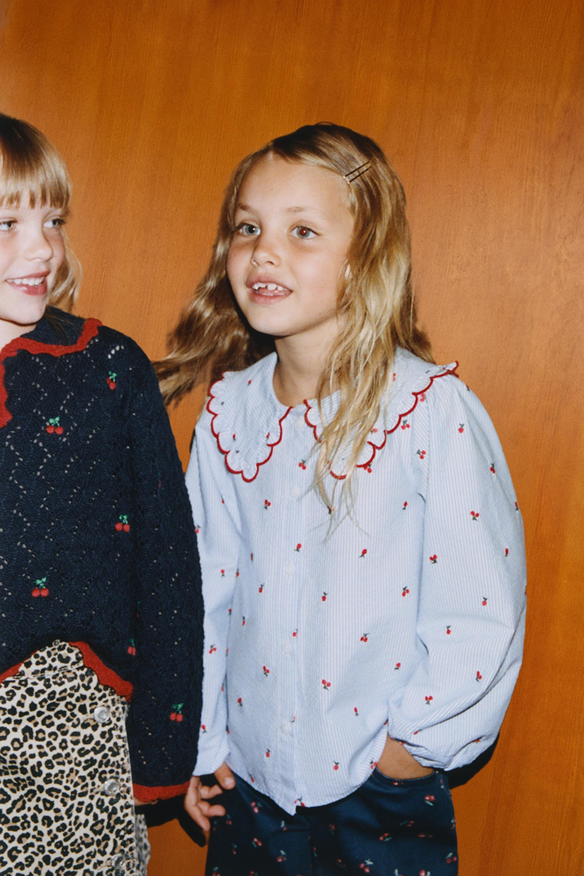 Long sleeve shirt with a Peter Pan collar featuring contrast piped ruffle trim and elasticated cu... | Zara UK