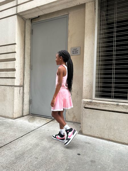 Girls cute tennis outfit - tennis skirt, tank, pink high top sneakers 

#LTKShoeCrush #LTKKids #LTKStyleTip