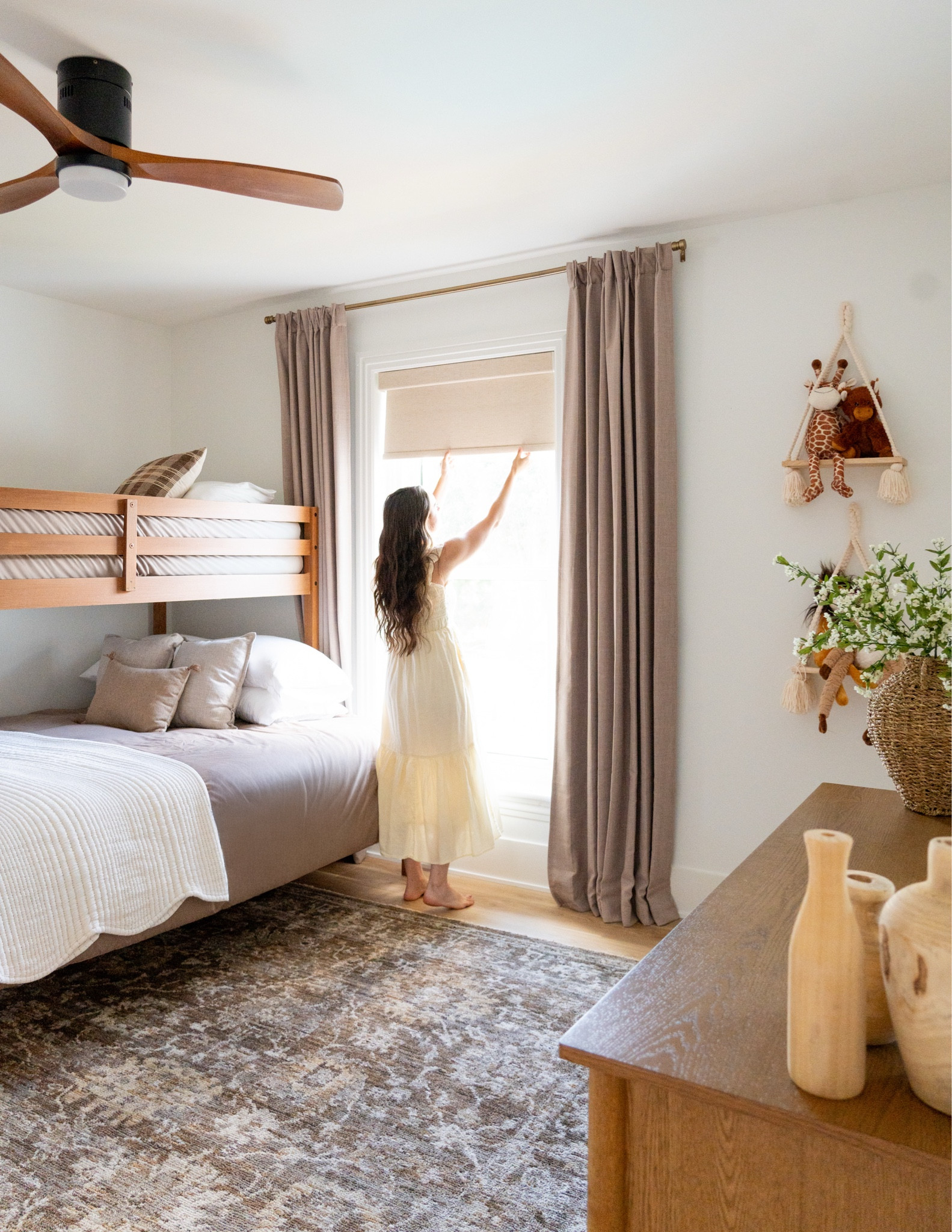 Blackout roller shades for indoor windows have been so helpful for the long summer sunny evenings when it’s wind-down time & we want it darker in our home. 
Roller shade color: blackout cream
Curtain color: burlywood birch 
