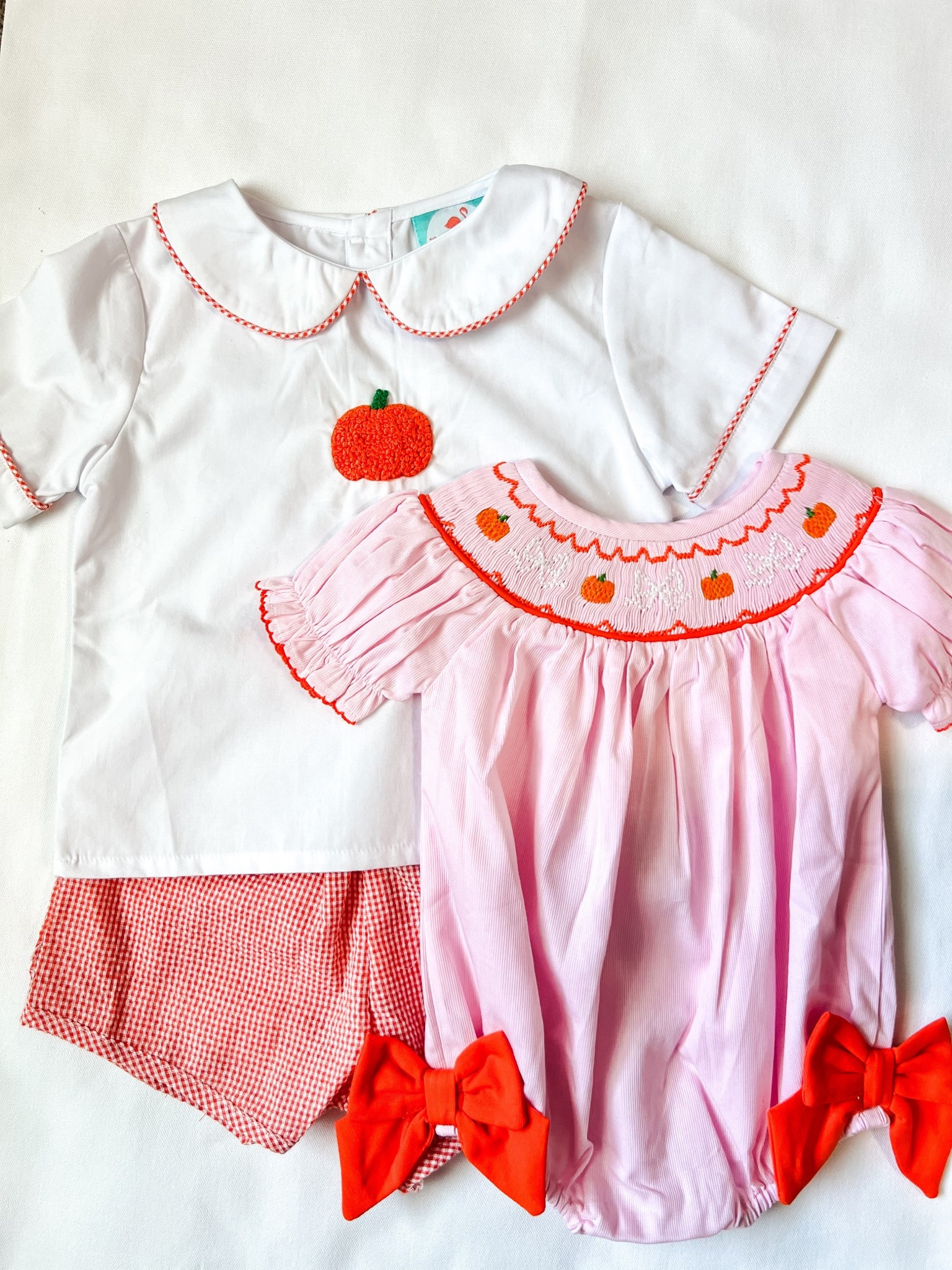Fall pumpkin sibling outfits/ Little sister / Smocked pink pumpkin bow bubble / Big brother / Pumpkin seersucker short set / 

#LTKSeasonal #LTKKids #LTKBaby