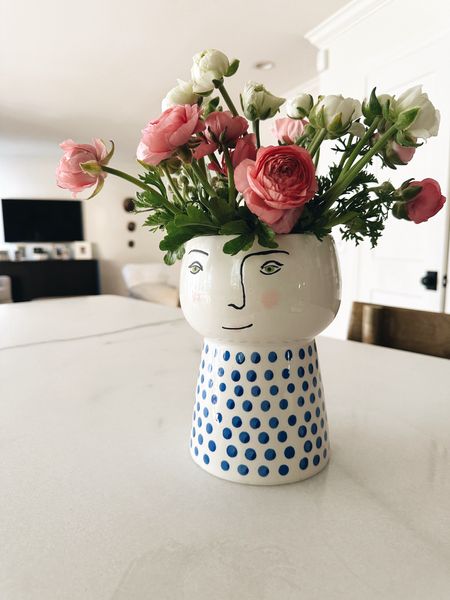 This vase still makes me so happy! Filled with some Trader Joe’s renunculas ( sp? ) for a whimsical easy spring arrangement. 

#LTKSeasonal #LTKhome