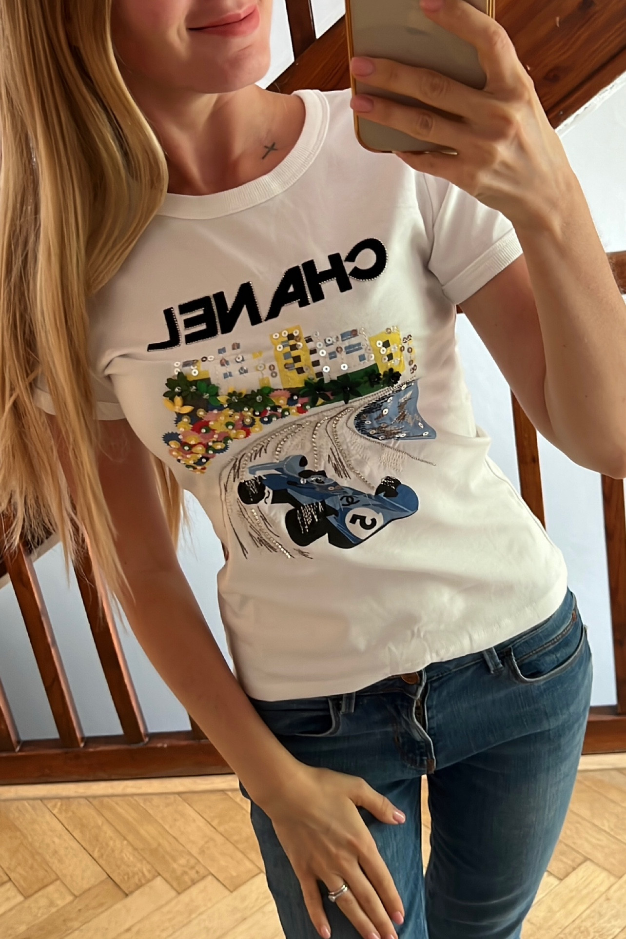 Chanel inspired f1 shirt 

#LTKFind #LTKstyletip