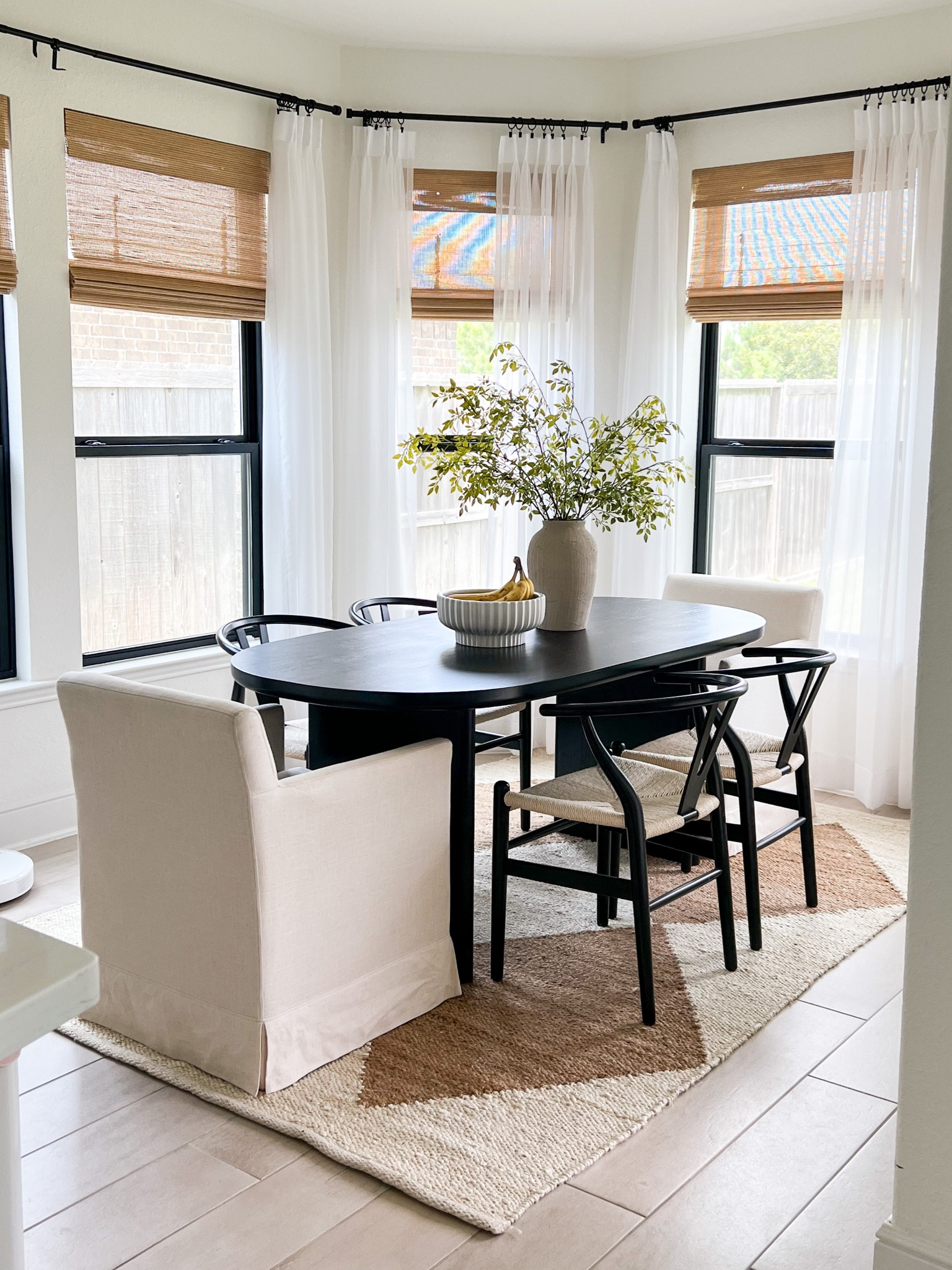 Loving our new breakfast room setup! Dining room. Dining room decor. Dining room table. Breakfast room. Home decor. Area rugs. Jute rugs. Dining chairs. 

#LTKFind #LTKhome #LTKunder100