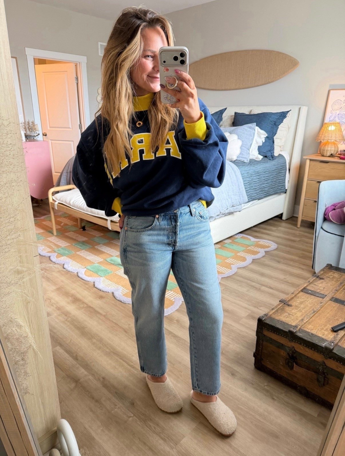 Cozy but still put together 💙💛

Layered this sweatshirt for a little contrast (and warmth), paired with straight leg denim that actually fits through the hips + thighs without losing shape. Finished it off with the softest neutral clogs for that effortless, weekend vibe.

Easy layers. Good denim. Repeat outfit energy.

#ltkstyle #ltkdenim #casualoutfit #everydaystyle #layeredlook #straightlegjeans #cozyvibes #momstyle #springlayers #preppystyle
