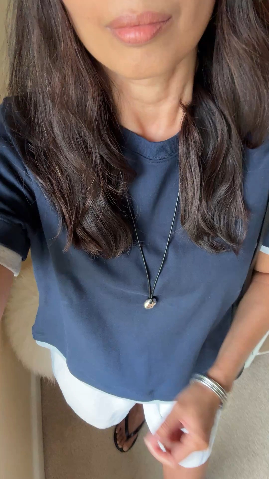 Pendant necklace. I have been looking for a necklace of this style and I like smaller look to this one. Adjustable length. Seems good quality and looks great in person.

Navy / White / Silver summer combo with elevated basics. 
- I used to always choose black over navy, but have grown to really like a good dark blue piece. It looks chic with cool crisp whites, grays, and silver. 

- Exact top is an updated version of one of my favorite cotton t-shirts. Multiple colors also available. I size up. 
- Exact shorts are a nice elevated, but comfy linen blend option. Good option to dress up if needed. Multiple colors also available. True to size. 
- I have been eyeing pendant necklaces of this style. I like this smaller style which makes a subtle statement. 
- Matching black bag and sandals to finish.

#LTKootd #LTKOver40 #LTKTravel