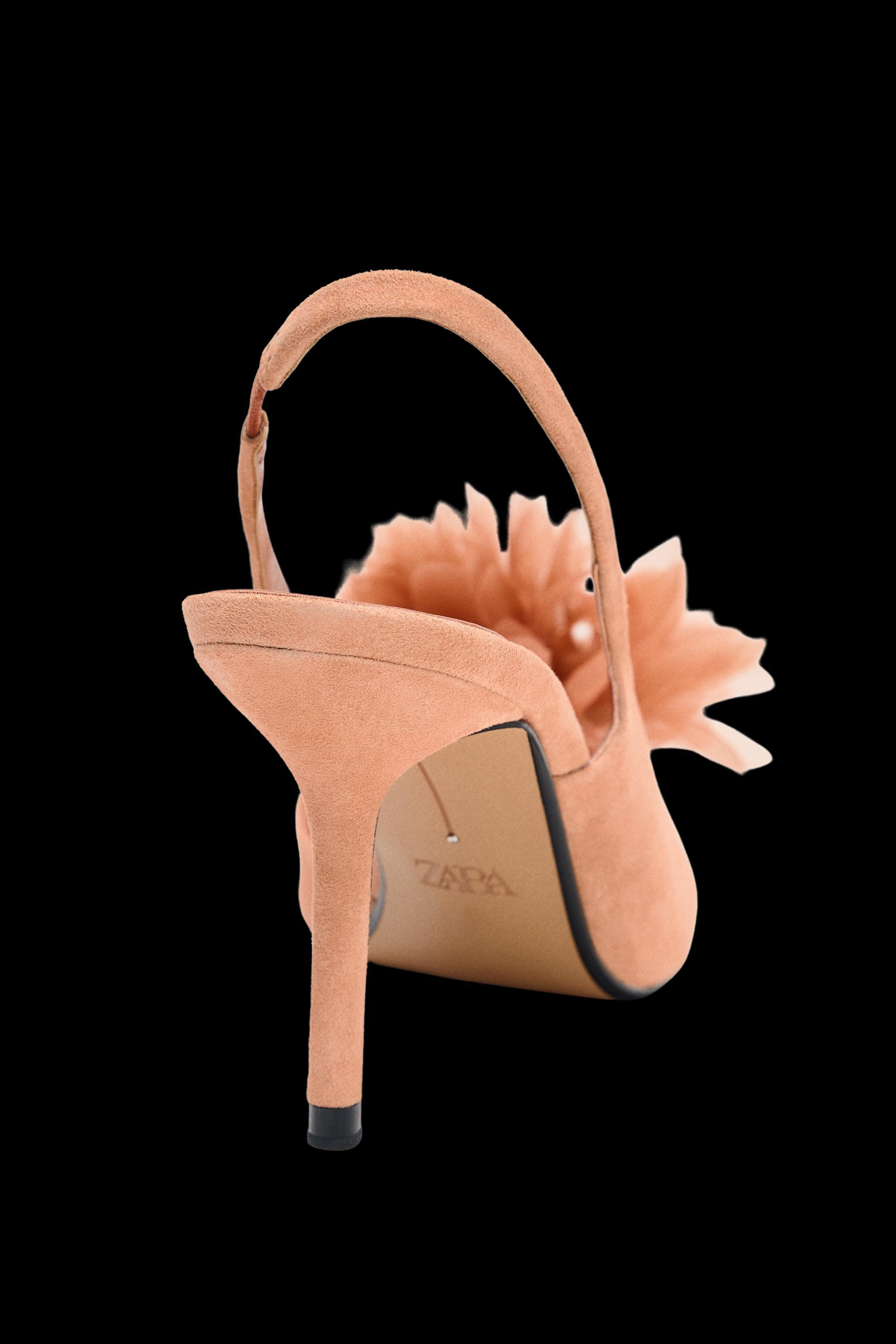 DescriptionContentsMeasurementsBlock heel ankle boots. Side zip closure. Back pull tab. Rounded t... | Zara US