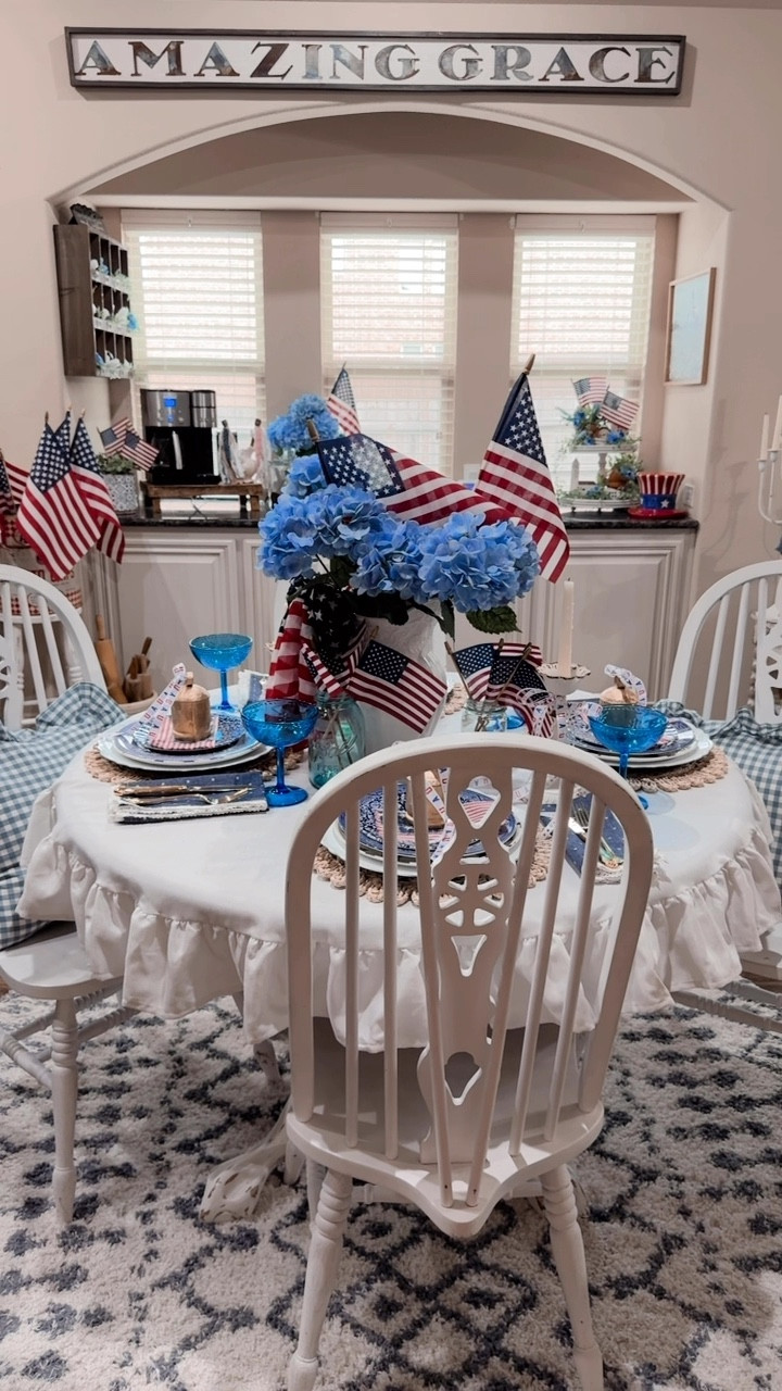 May we always anchor our lives in His amazing grace. 🤍🇺🇸🤍

When faith is the foundation, even the simplest decor becomes a reflection of something deeper.  Let your table be more than just pretty, let it reflect who you and your family live…woven together with love and anchored in Grace.  

To create this cozy, patriotic table setting, I layered blue and white gingham with vintage-inspired dishes, added woven chargers for warmth, and tucked mini flags into blue hydrangeas for a soft but meaningful centerpiece. Don’t be afraid to mix textures like ceramics, ruffles, and glassware all work together to tell a story of home and heritage.

#AmazingGrace #PatrioticDecor #FaithFilledHome #WeatheredWhimsy #LTKhome #GodBlessAmerica #fourthofjulydecor #homedecor #kitchenddcor #tablesetting #tablescape 




#LTKHome #LTKSaleAlert #LTKSeasonal
