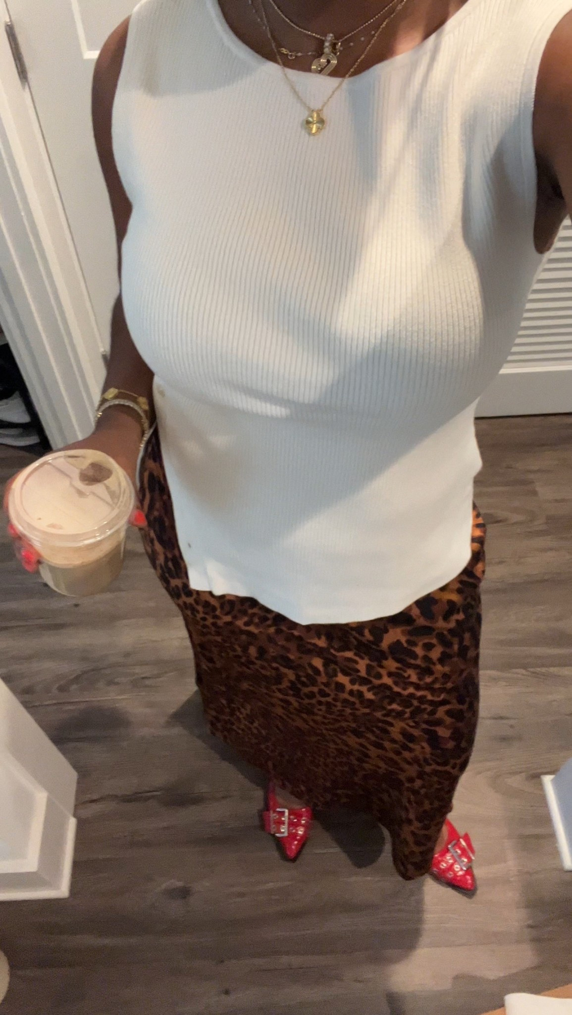 clean classy corporate outfit: asymmetrical sweater top + fun skirt + red shoes + gold jewelry 

#LTKStyleTip #LTKWorkwear #LTKFindsUnder100