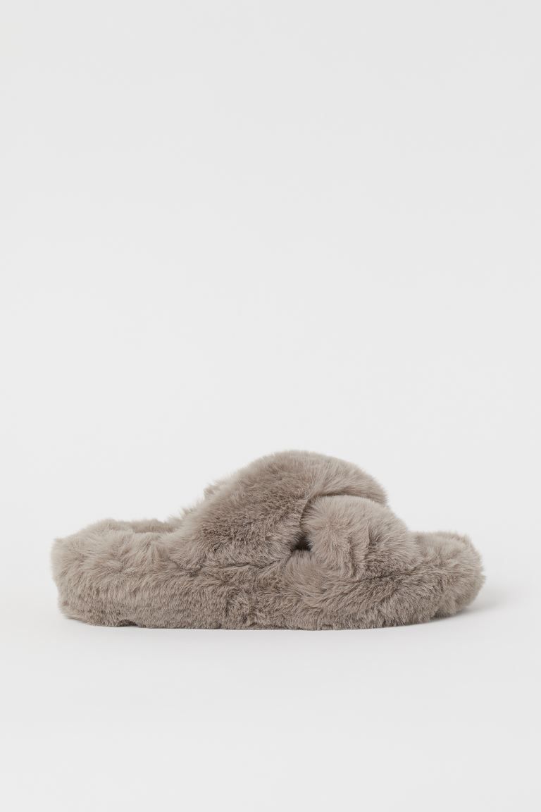 Slippers in soft faux fur with open toes and crossover foot straps. Faux fur lining and insoles. ... | H&M (US + CA)