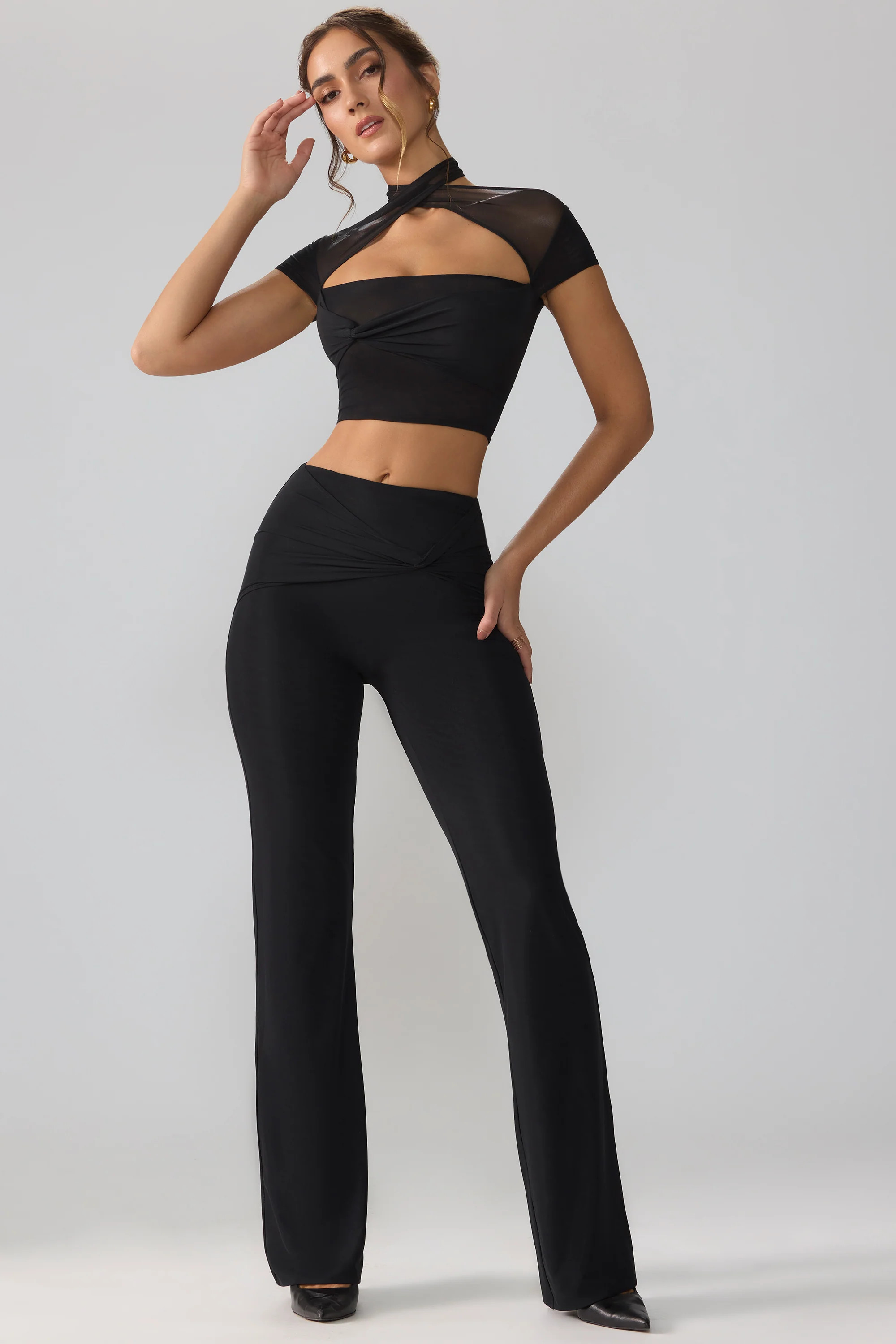 Mesh Mid Rise Twist Overlay Flare Trousers in Black | Oh Polly