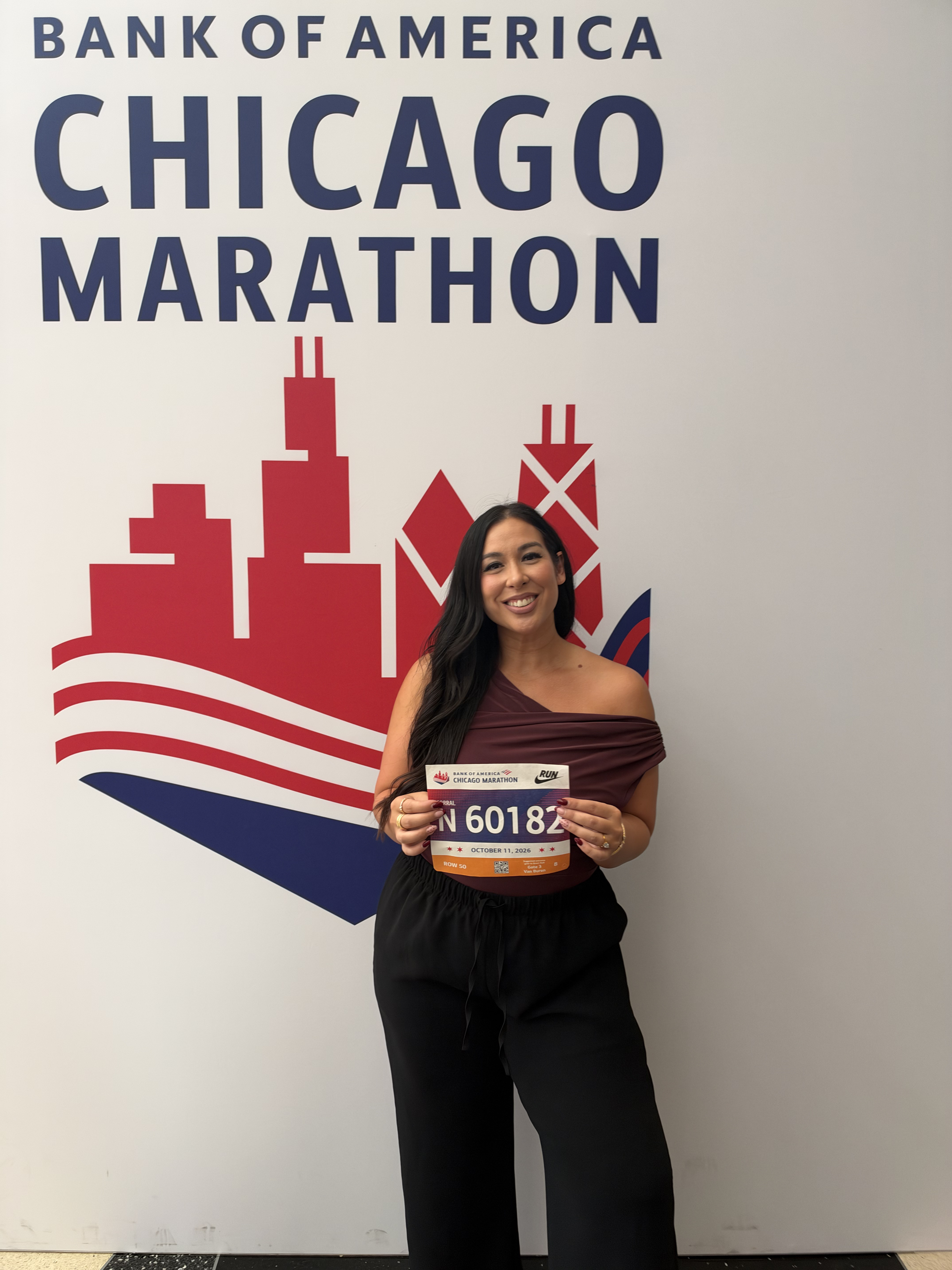 Me and my bib number from The Chicago Marathon this past weekend! Wearing my favorite wrinkle resistant pants in an XL and my top is an XL as well. Midsize, midsize fashion, fall fashion, fall, Chicago Marathon 2026