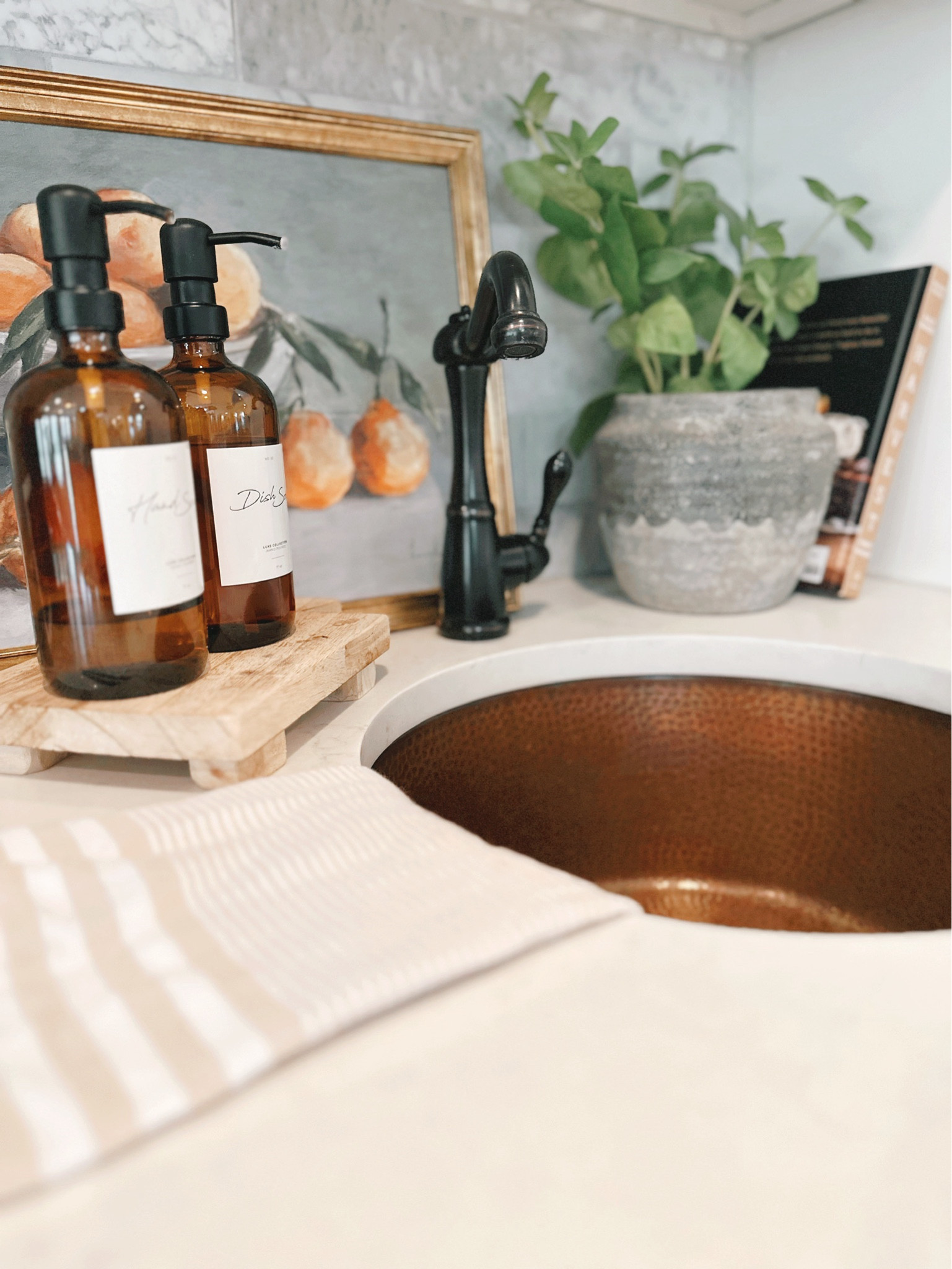 Kitchen countertop decor, kitchen inspo, kitchen decor, hand soap container, faux plant 

#LTKHome #LTKStyleTip #LTKSaleAlert