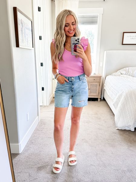 American Eagle 6” inseam Jean shorts on sale! 

Paired with this cute ruffle tank from old navy for under $10! 

Sizing: shorts run a tad big. If in between, I would size down one. I got a 2!

Shirt is an XS! I’m normally a XS-small

#LTKSaleAlert #LTKFindsUnder50 #LTKStyleTip