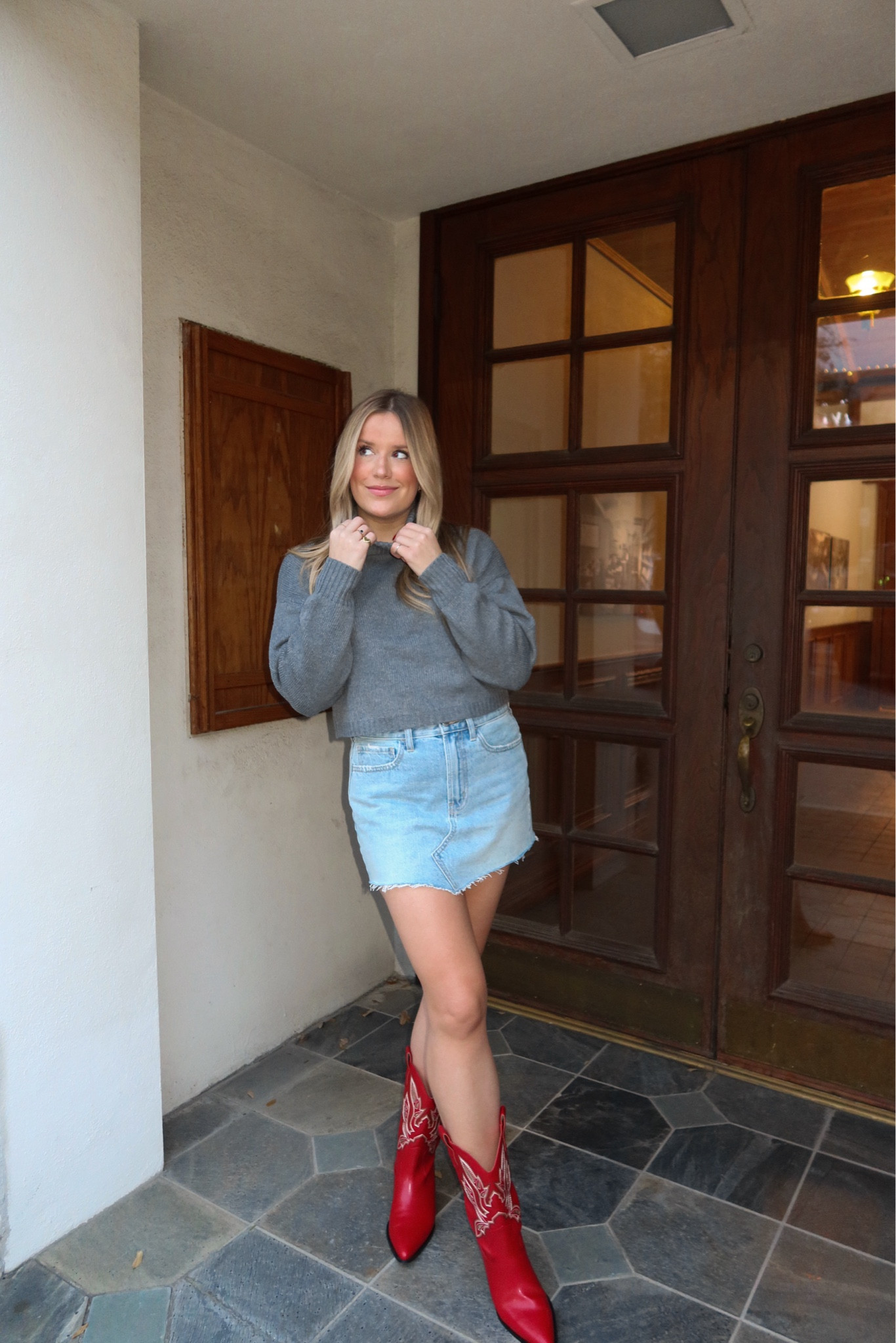 Red cowboy boots denim skirt grey sweater 

#LTKshoecrush #LTKSeasonal #LTKfindsunder100