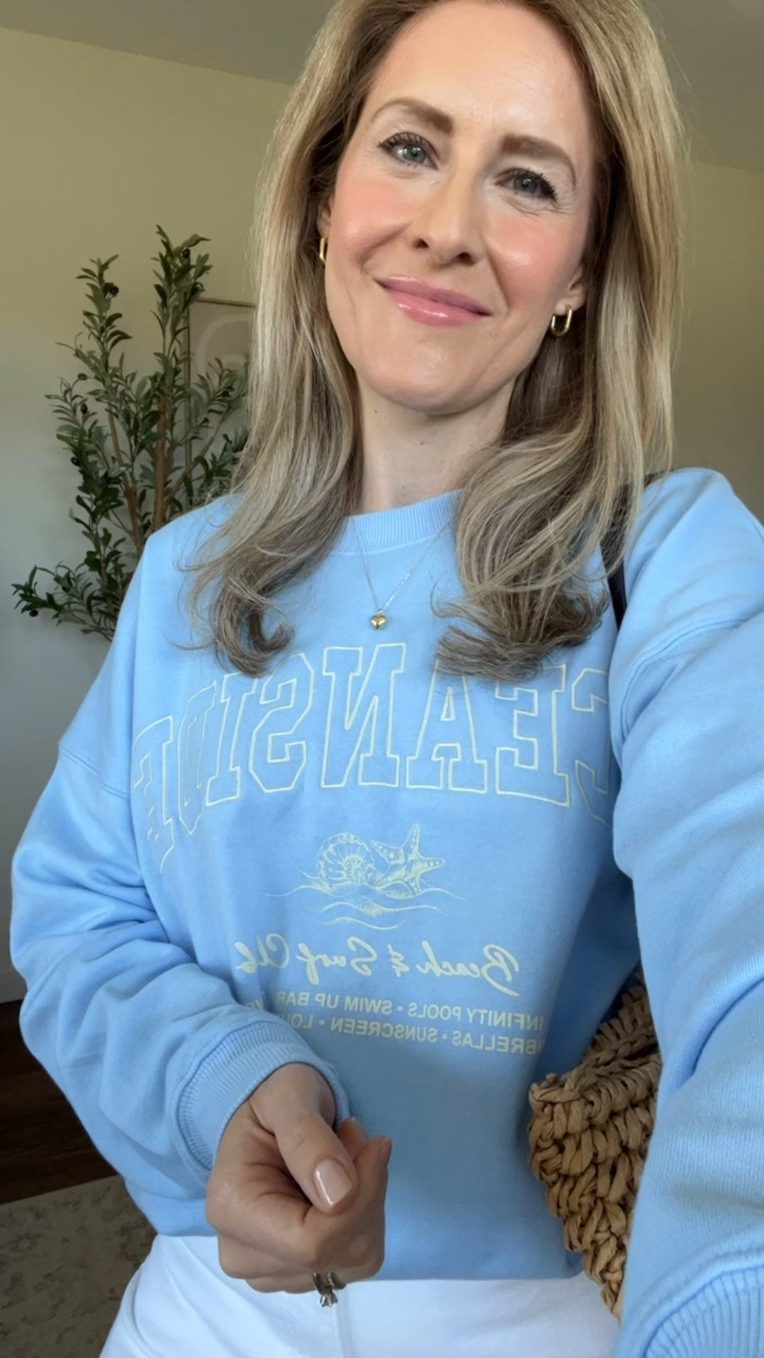 Walmart graphic sweatshirt just $14.98! I sized up to large here. Four styles to choose from. #walmartfashion 

#LTKootd #LTKOver40 #LTKmomlife