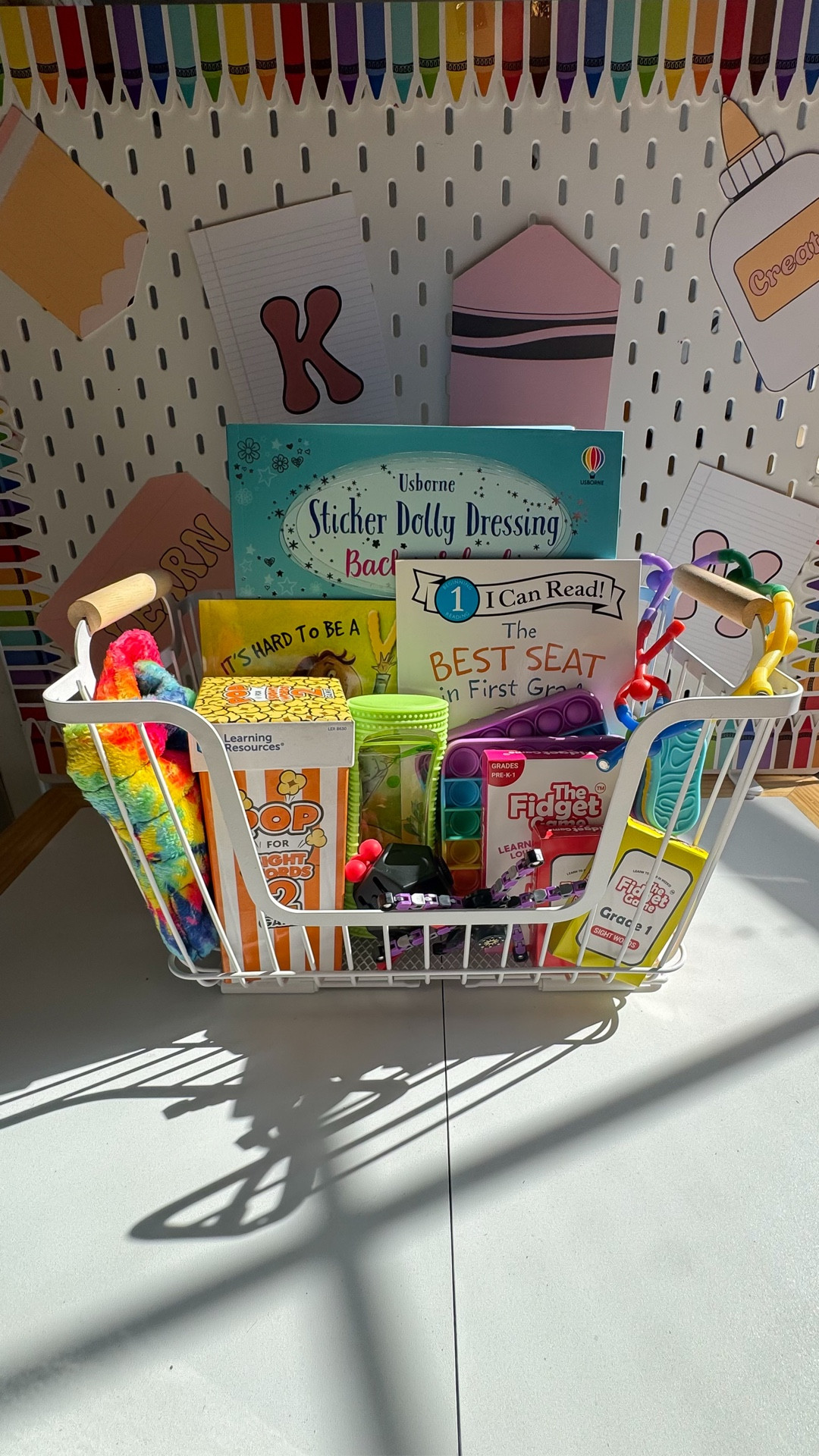 Our morning basket turns into our afternoon basket during the school year.

It’s always out and if the kids have time before school they can grab something. They rarely tell me that they’re bored, but when they do, I send them straight to the basket. It’s a collection of educational  fidget and sensory toys that the kids love!

#LTKSeasonal #LTKKids #LTKFamily