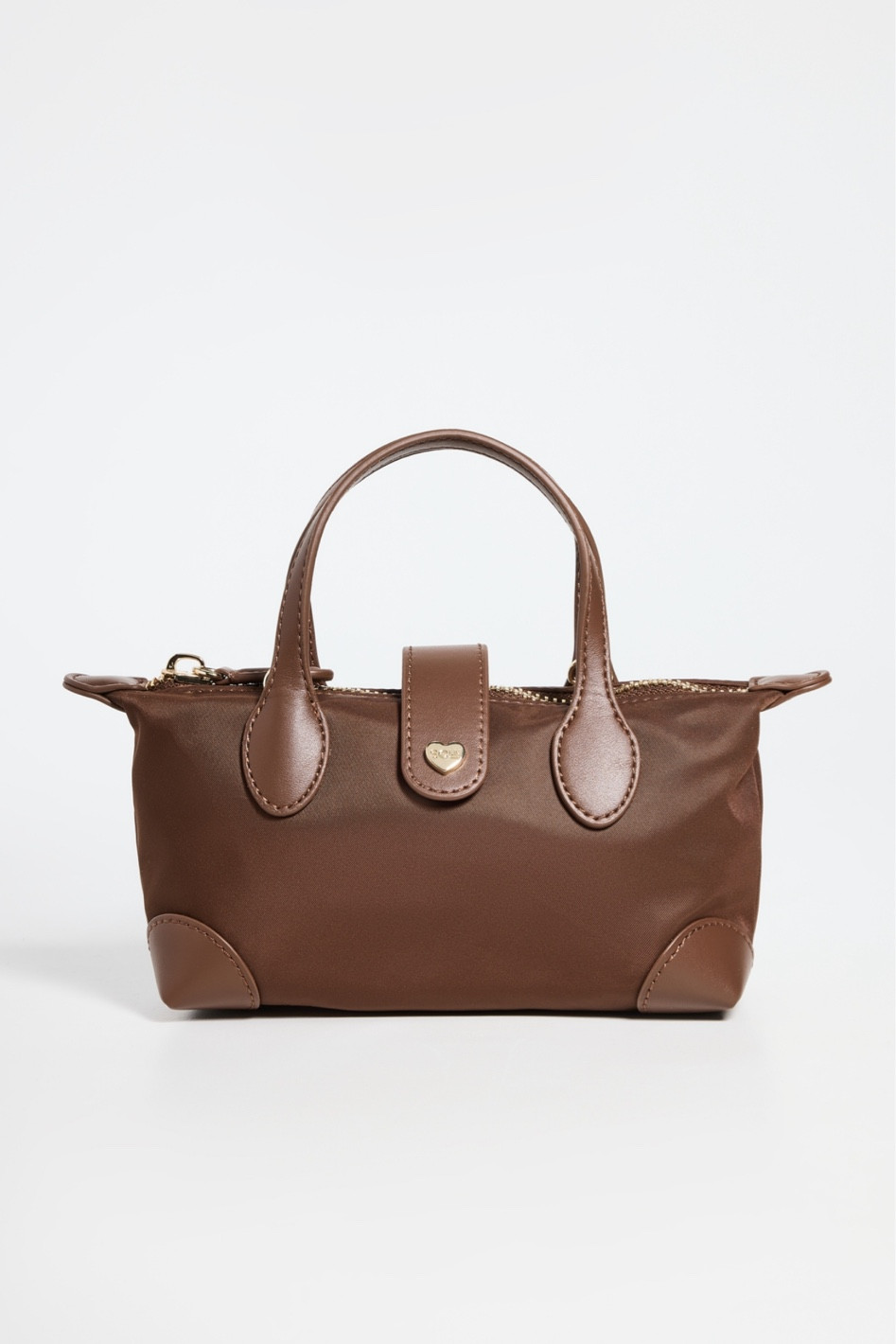 She’s backkkk! 
The super popular limited edition Stoney clover lane micro pouchette crossbody bag just restocked in Espresso! And of course I needed to buy it, it sold out super quick on the SCL website. It’s the perfect fall staple and the perfect mini size and can easily fit makeup, phone, wallet, and lip products for those touch ups 

#LTKGiftGuide #LTKSeasonal #LTKHoliday