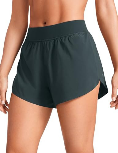 CRZ YOGA Mid Waisted Dolphin Athletic Shorts for Women 4" Lightweight High Split for Gym Workout with Liner Quick Dry Melanite XX-Small | Amazon (US)