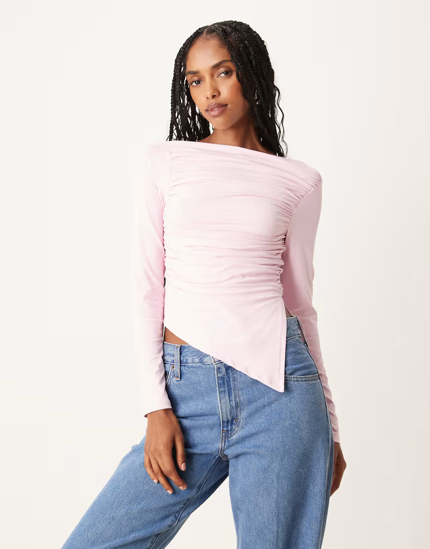 ASOS DESIGN ruched side asymmetric hem long sleeve top in pink | ASOS (Global)