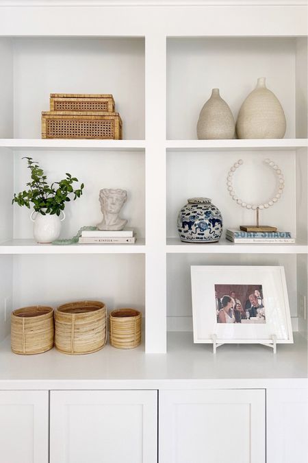 Coastal bookshelf styling from Amazon

interior decor white natural woven rattan vase basket statue art

#LTKunder50 #LTKhome #LTKstyletip