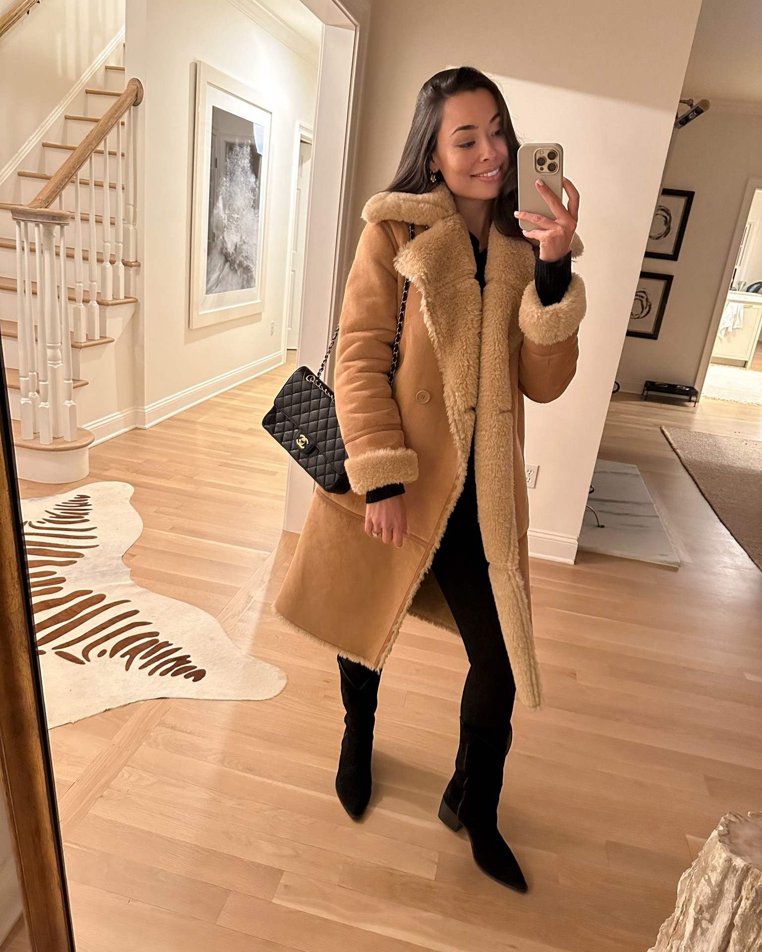 Kat Jamieson wears a winter outfit for date night. Shearling coat, suede cowboy boots, Chanel bag. 

#LTKitbag #LTKSeasonal #LTKshoecrush