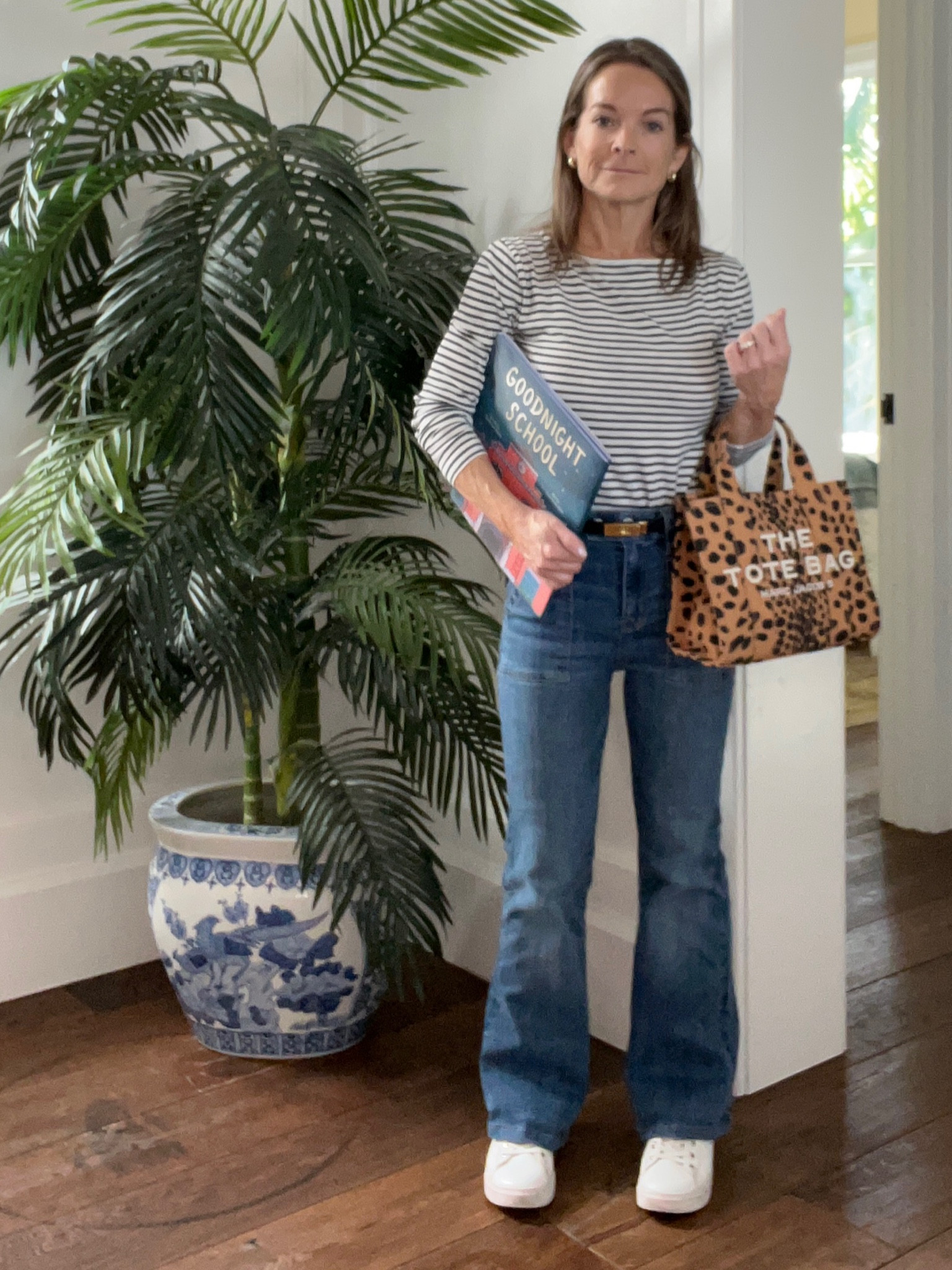 Yes, I am design and decor obsessed, but I also have a day job as a children’s book author. That means that I go to a LOT of events where I need to be comfortable, but you know, still cute and professional. Enter my all-time favorite jeans and tote bag! I actually have two pairs of these jeans because I kept one long to wear with heels. And I’m not gonna tell you how many of these tote bags I have in different colors because it’s just embarrassing lol! The exact AE jeans and J Crew Factory T-shirt are sold out, but I linked near identical options. Happy shopping! 



Petite jeans, preppy work outfit, short jeans, tote bag, white sneakers 